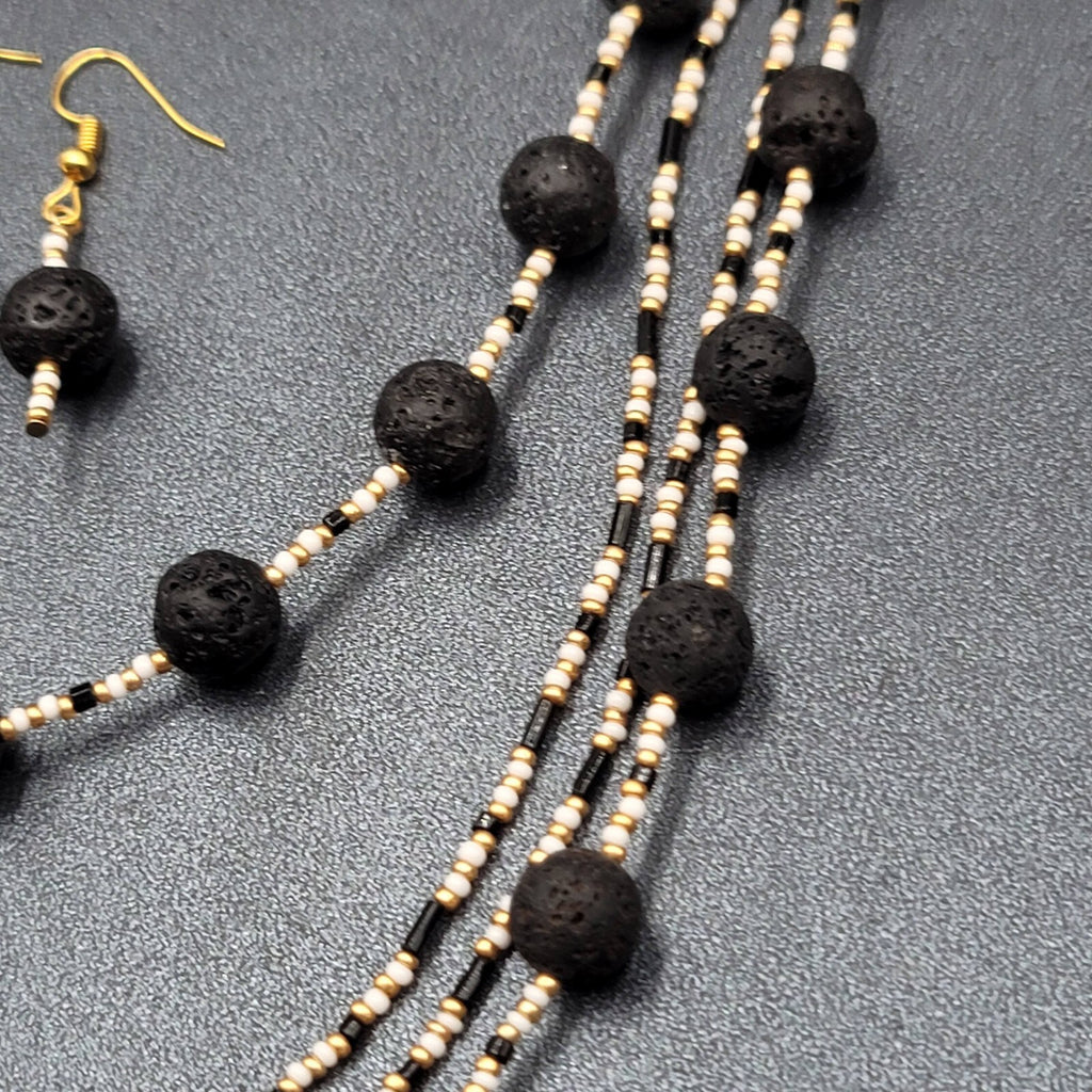 Beaded Necklace Bracelet Earrings Set Gold tone White Black Lava Bead Set