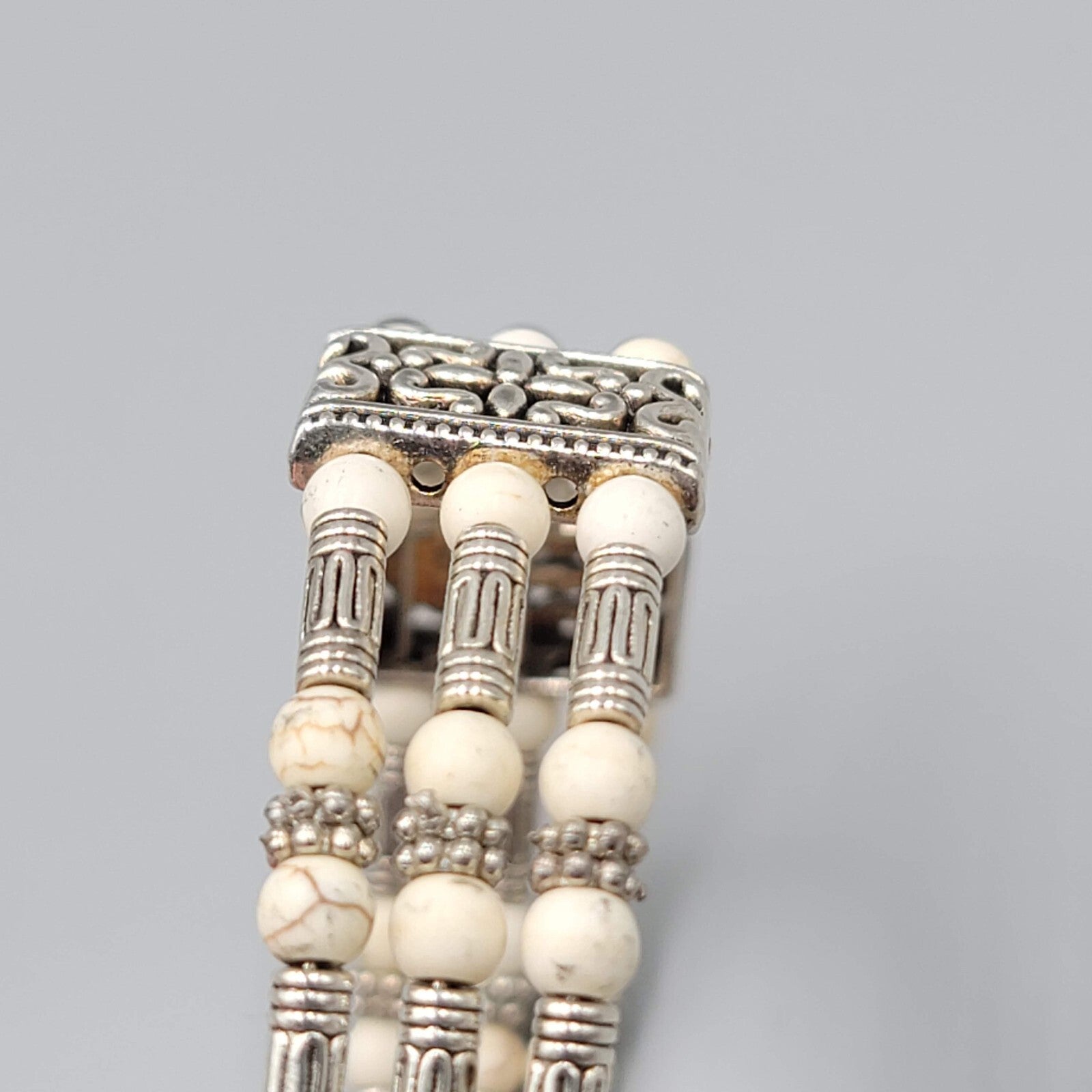 White Stone Bead Bracelet Triple Strand Silver tone Feather Charm 6.75"