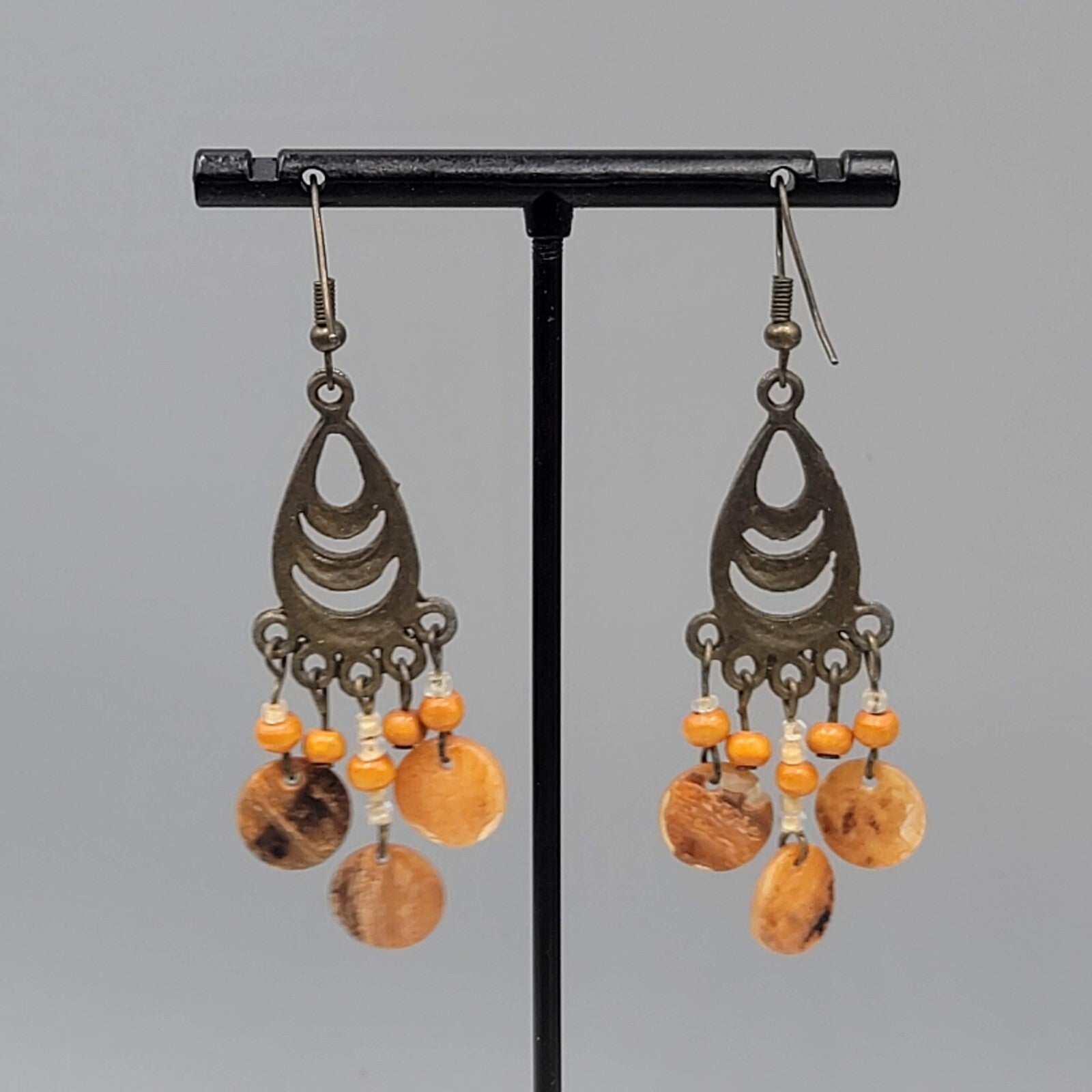 Bronze tone Chandelier Pierced Earrings Wood Bead Orange Shell Dangle 2"