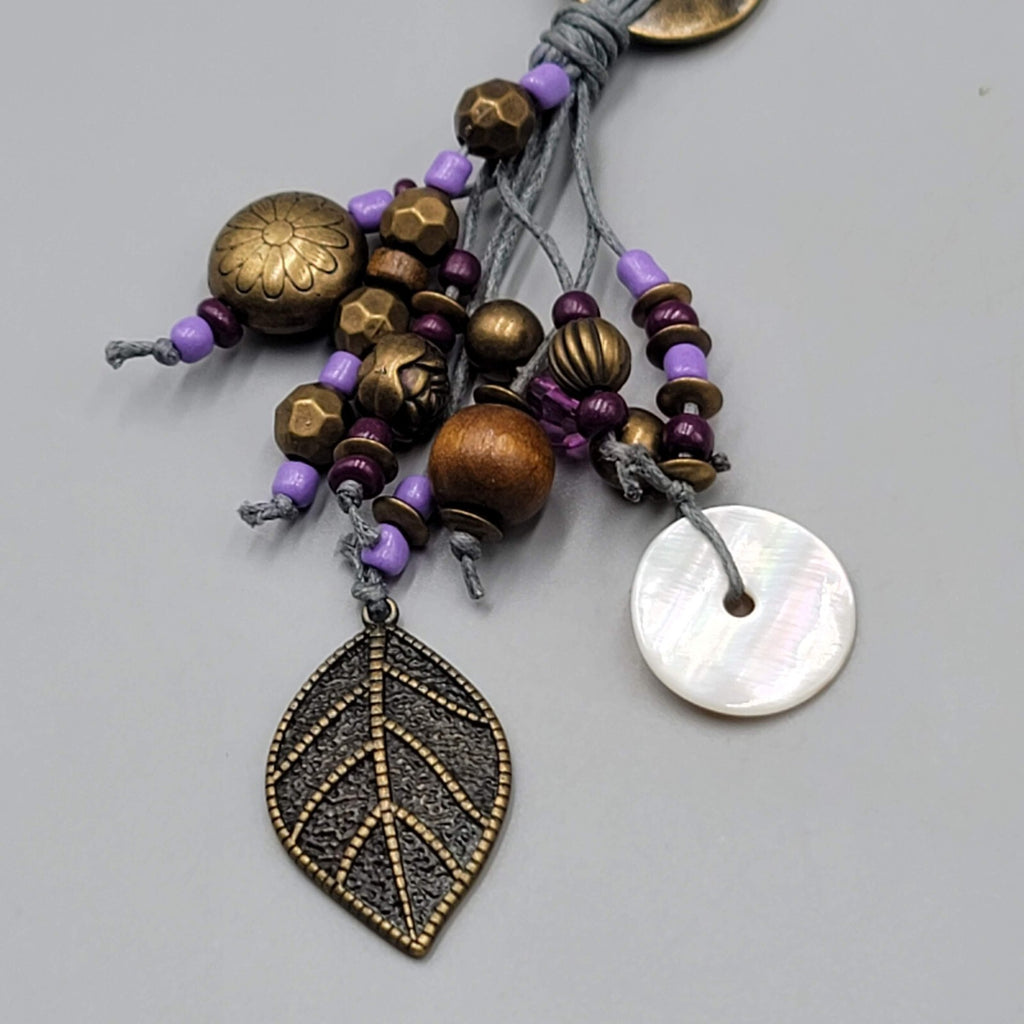 Long Charm Y Drop Necklace Bronze tone Purple Bead Gray Cord 32"