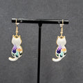 Pierced Earrings Gold tone Cat White Enamel Flowers Dangle 1.25"