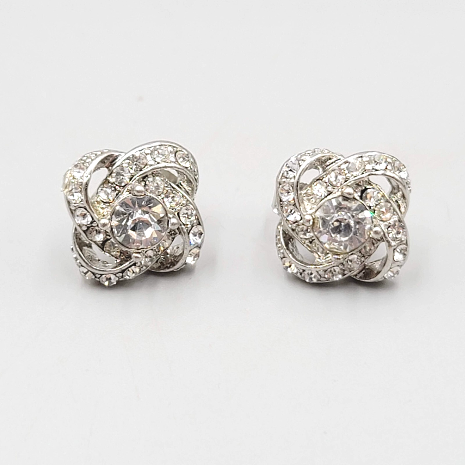 Stud Pierced Earrings Silver tone Rhinestone Knot Studs 5/8"