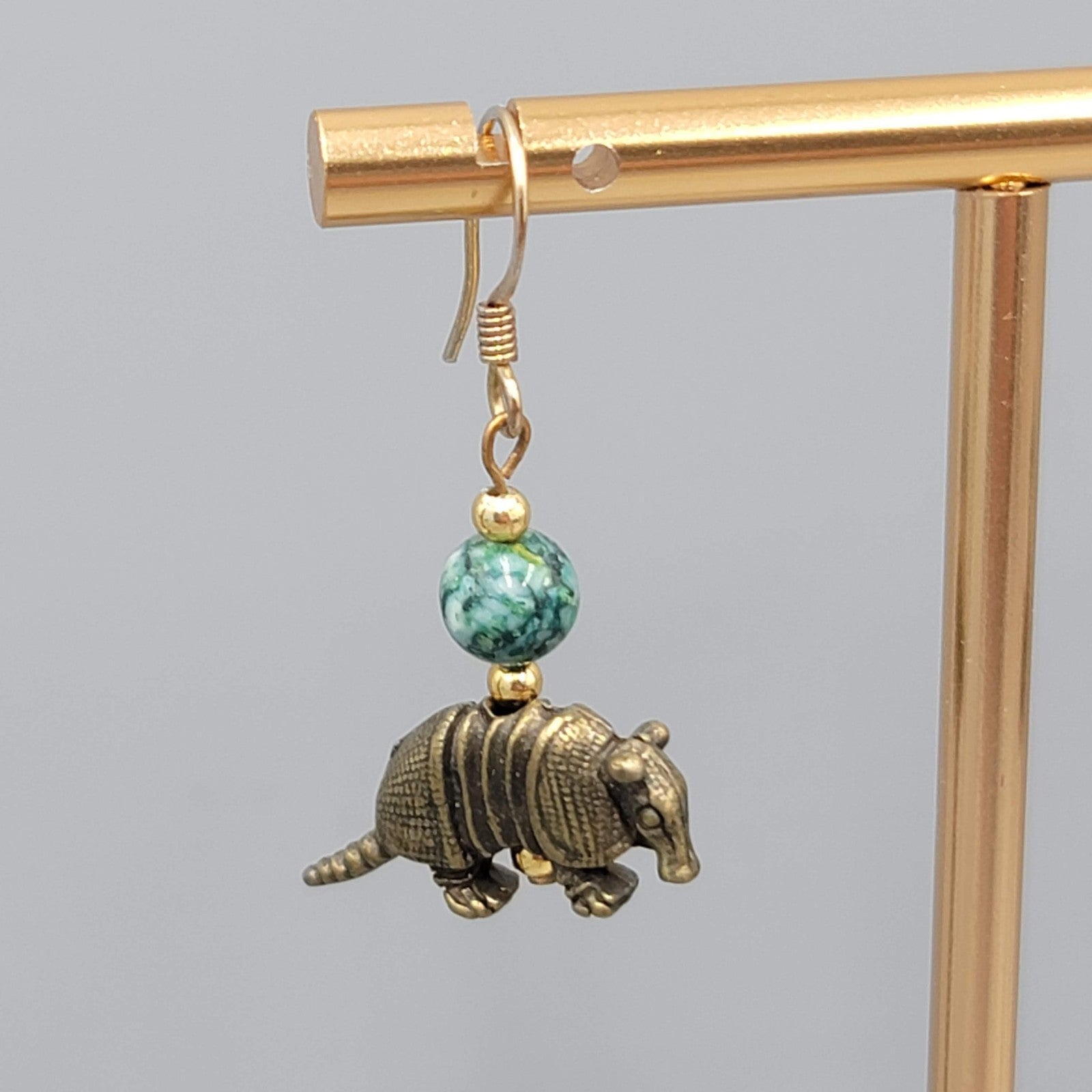 Armadillo Bead Pierced Earrings Bronze tone Dangle 7/8"