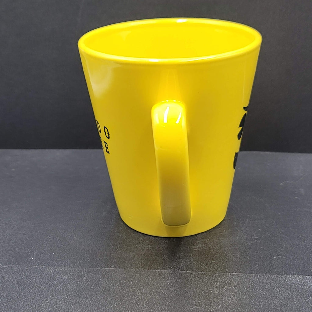 Torpedo Coffee Mug Cup Yellow Winky Face iti