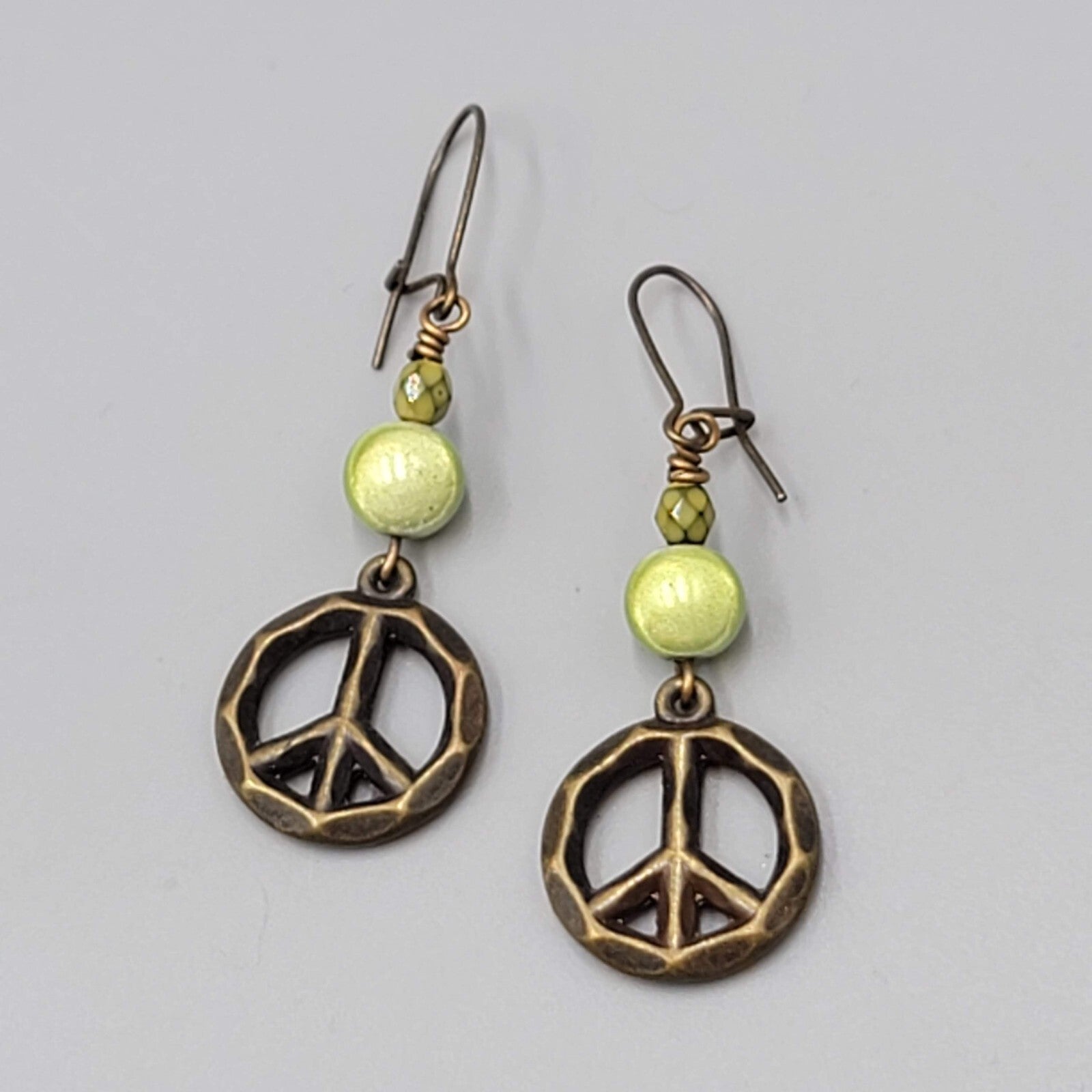 Peace Sign Pierced Earrings Bronze tone Green Bead Dangle 1.5"