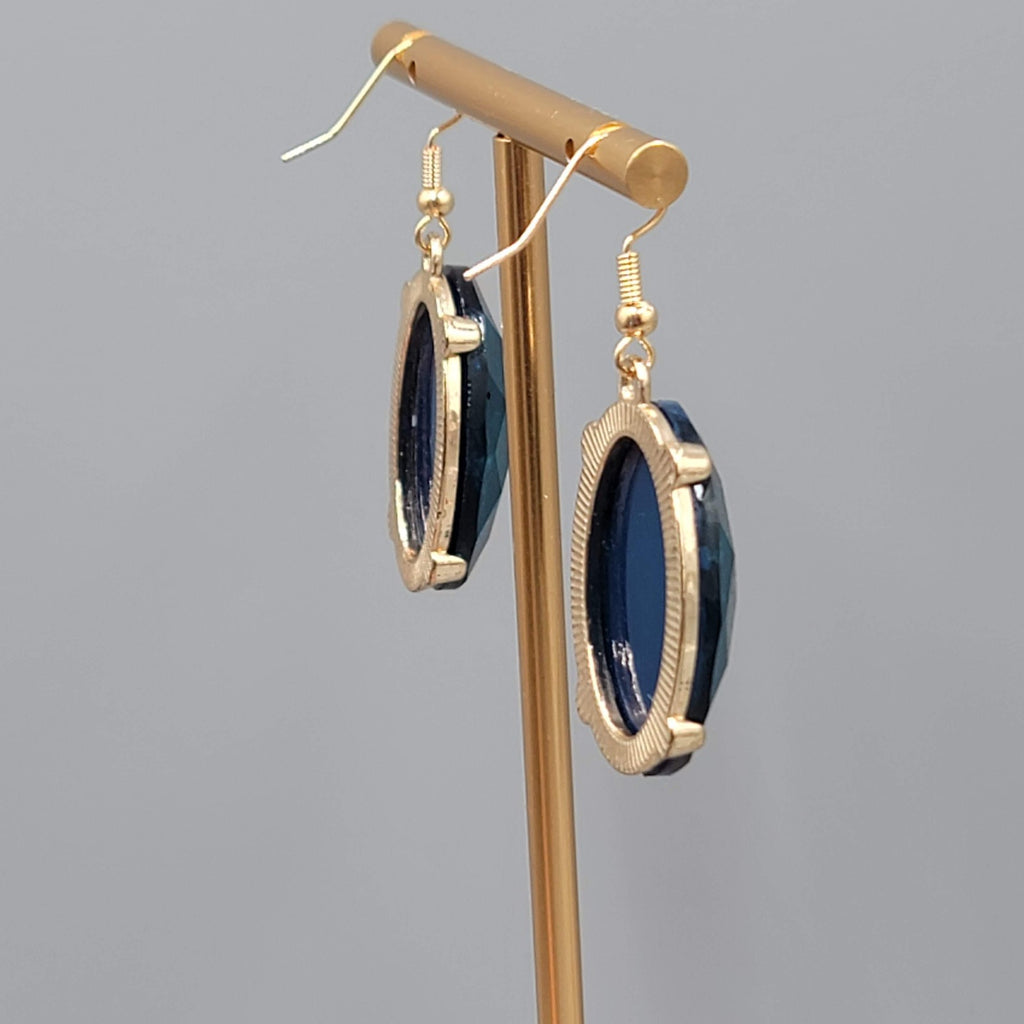 Blue Oval Faceted Swirl Resin Pierced Earrings Gold tone Dangle 1.25 in