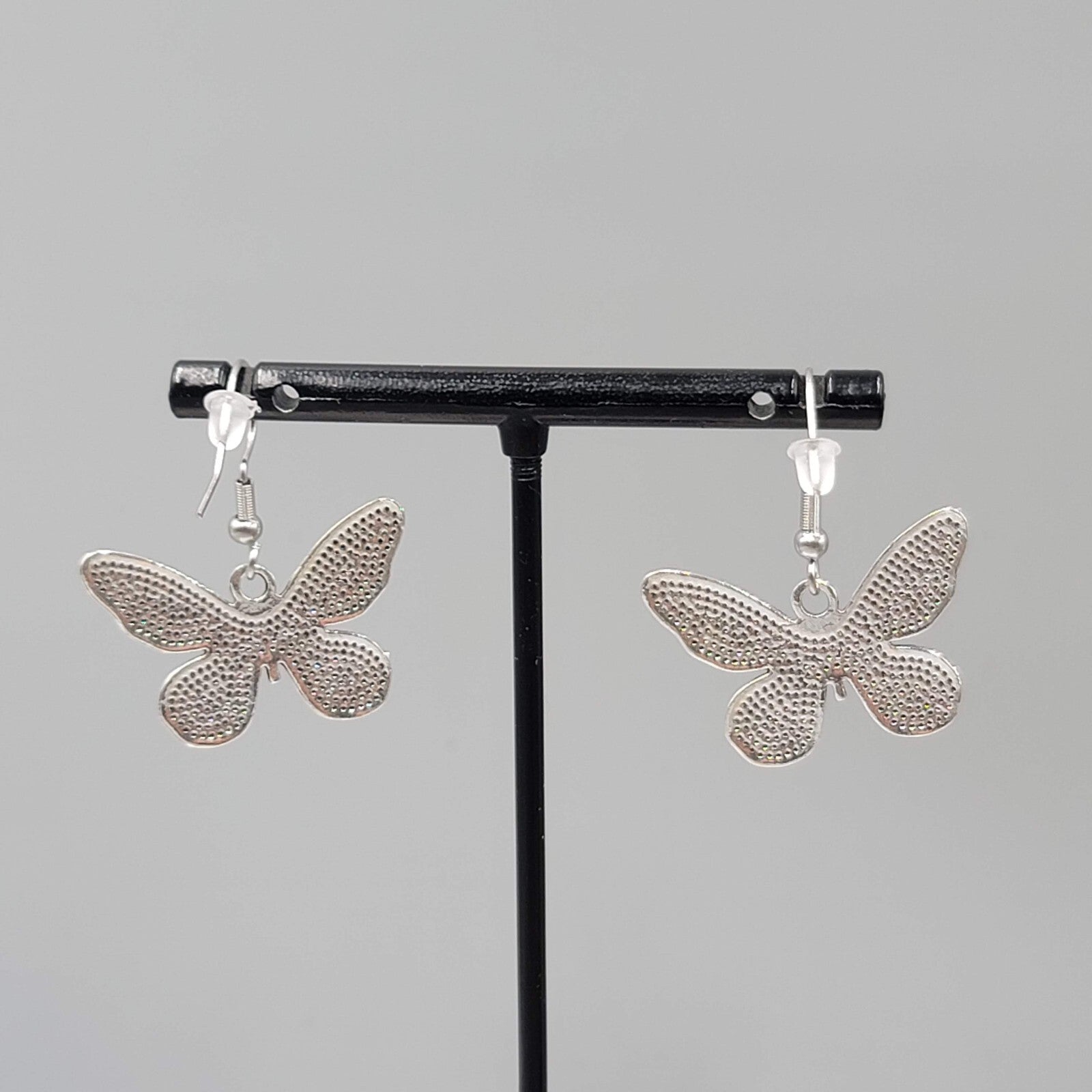 Butterfly Pierced Earrings Silver tone Embossed Dangle 3/4"