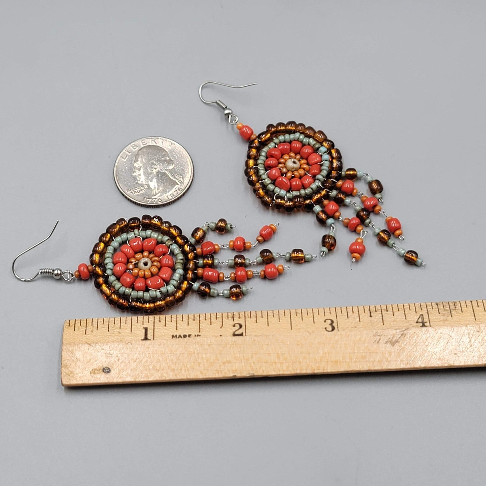 Medallion Bead Pierced Earrings Silver tone Dangle Orange Brown Blue 2.25"