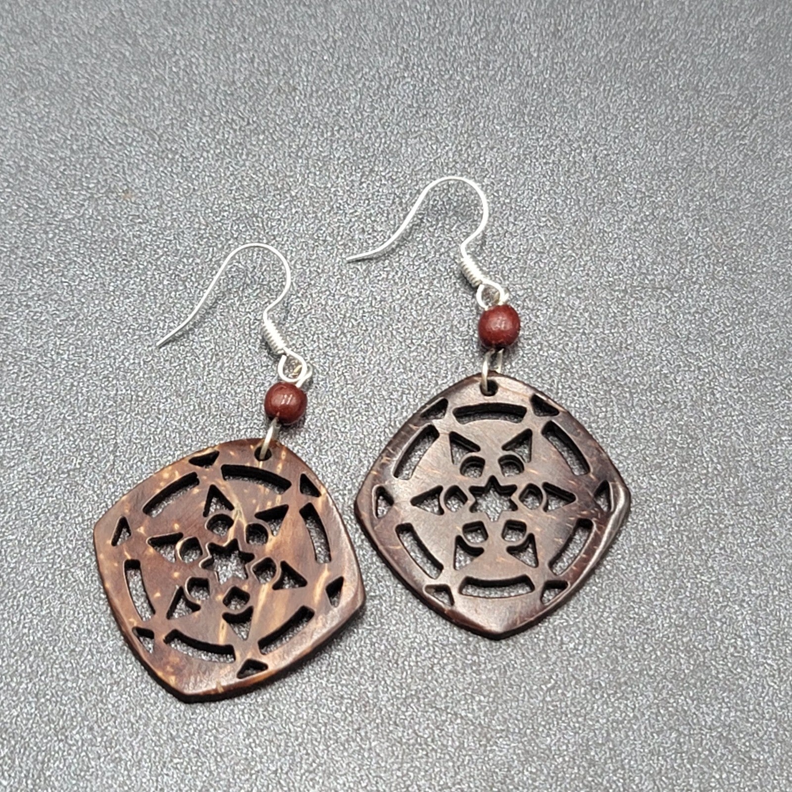 Pierced Earrings Silver tone Cut Coconut Bead Dangle 1.5"