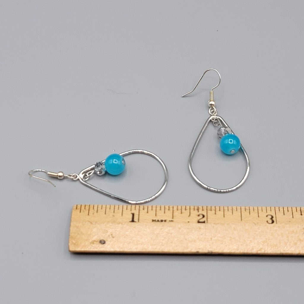 Pierced Earrings Silver tone Teardrop Hoops Blue Bead Dangle 1.5"