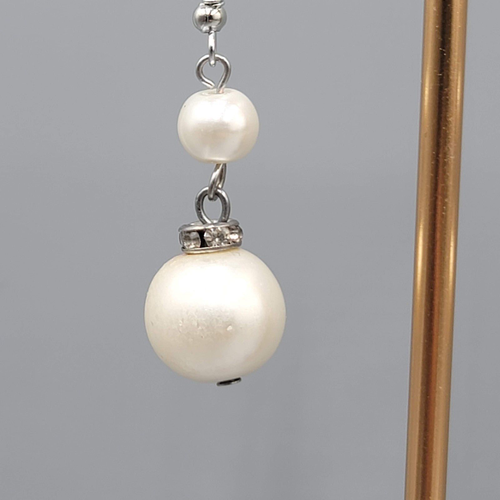 Satin Look White Bead Pierced Earrings Silver tone Dangle 1.25 in