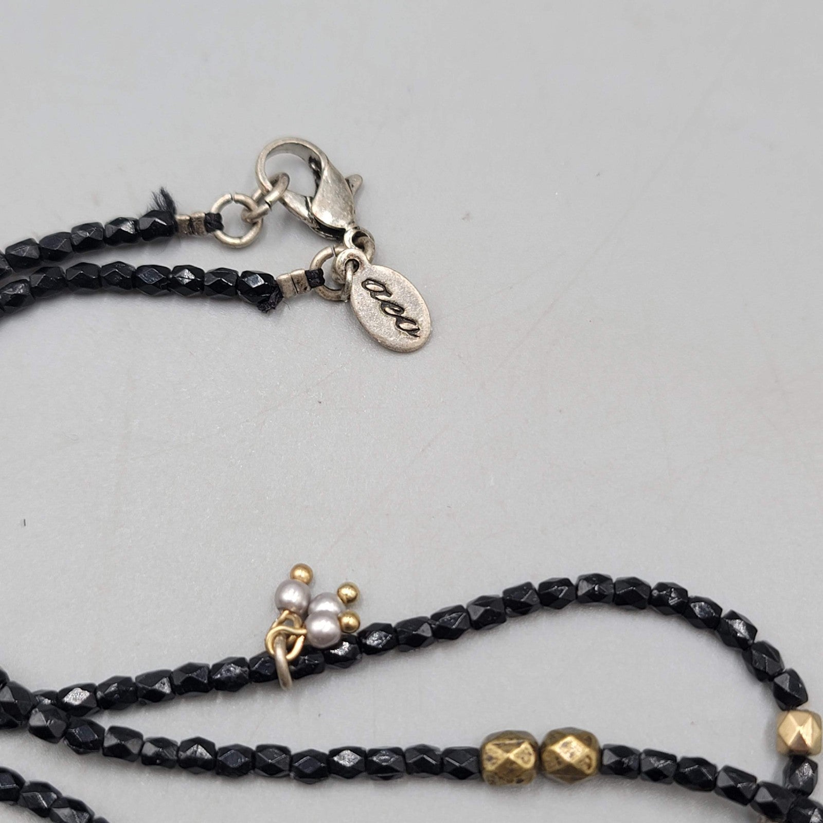 AEO American Eagle Outfitters Necklace Black Seed Bead Gold tone Charms Long 36"