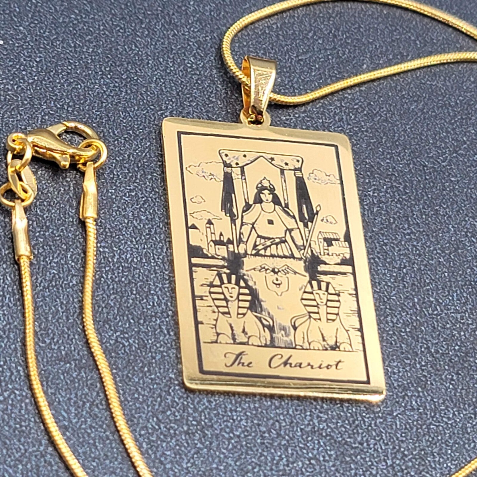The CHARIOT Tarot Card Pendant Necklace Major Arcana Gold tone 18”.