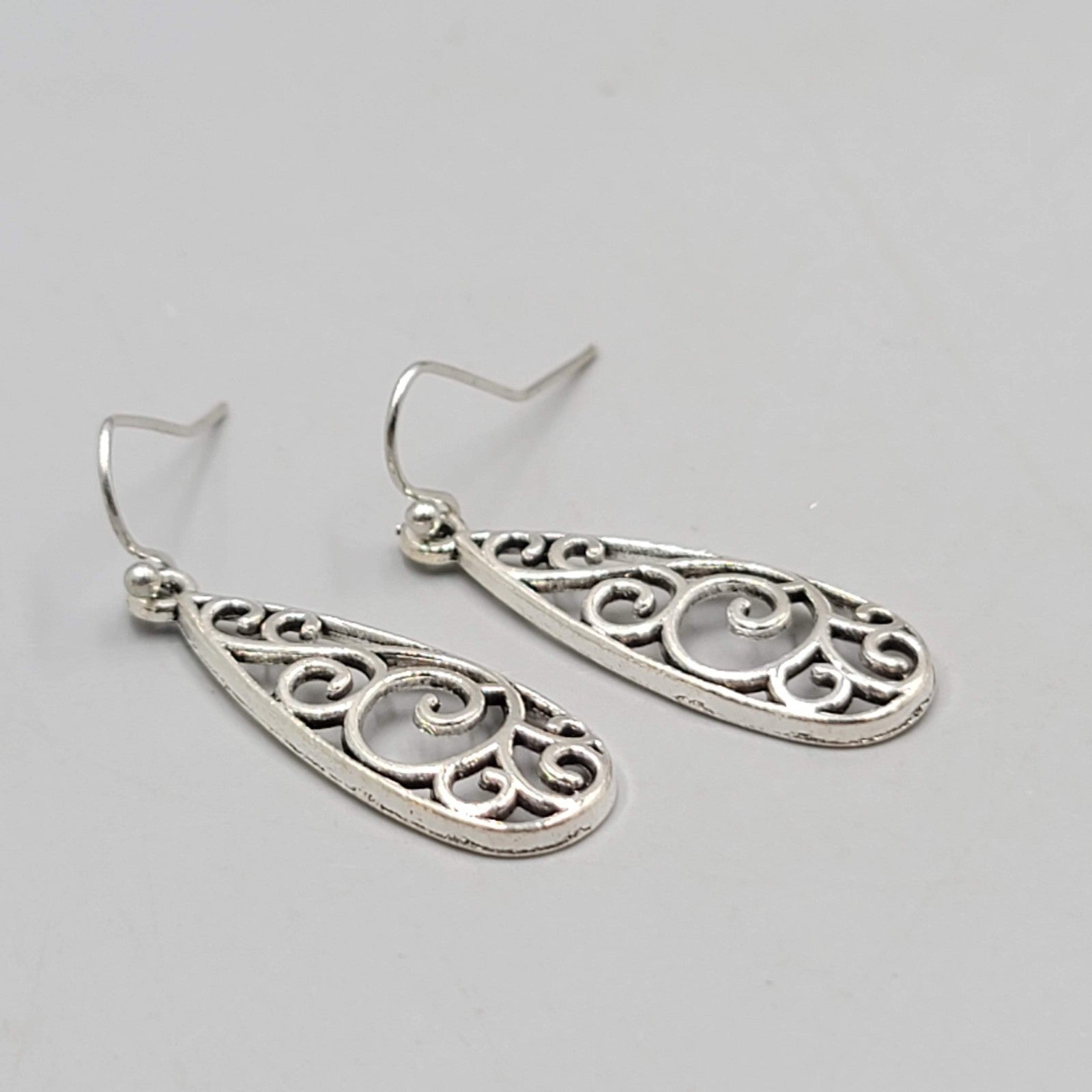 Open Filigree Long Teardrop Pierced Earrings Silver tone Dangle   1.25"