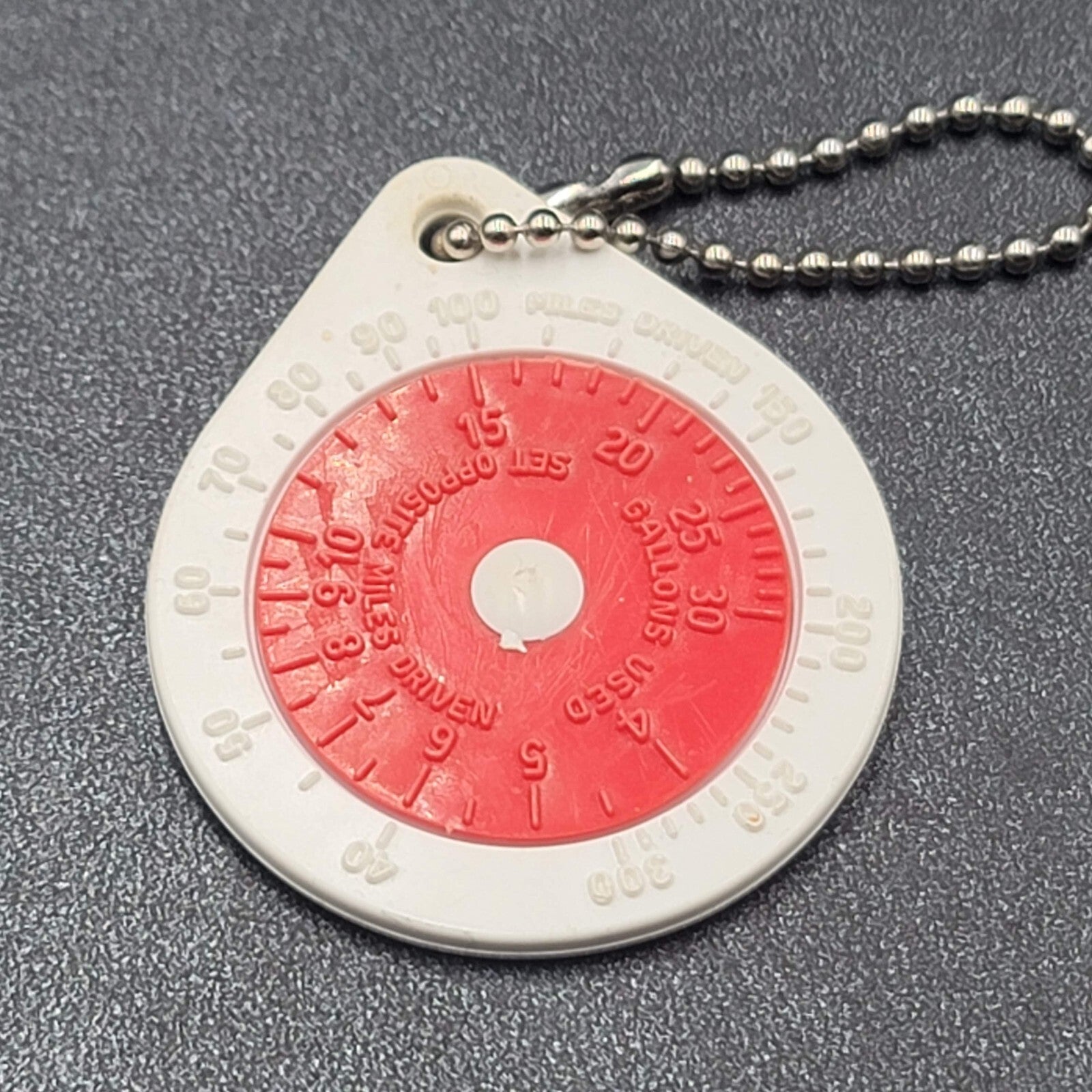 VINTAGE MOBIL ENERGY MINERALS US MILES PER GALLON ADVERTISING KEYCHAIN
