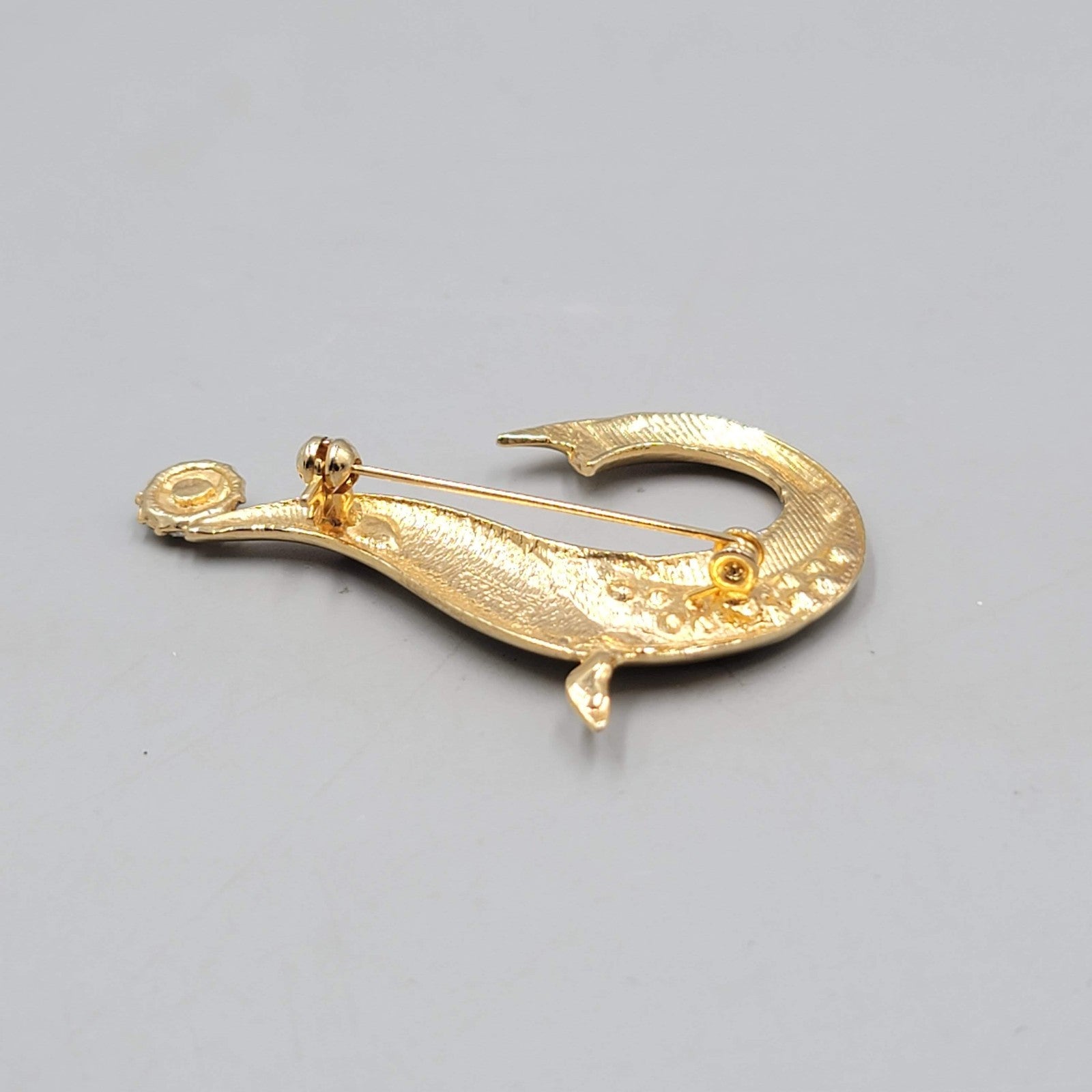 Vintage Seal Red Rhinestone Eye Brooch Gold tone 2.25"