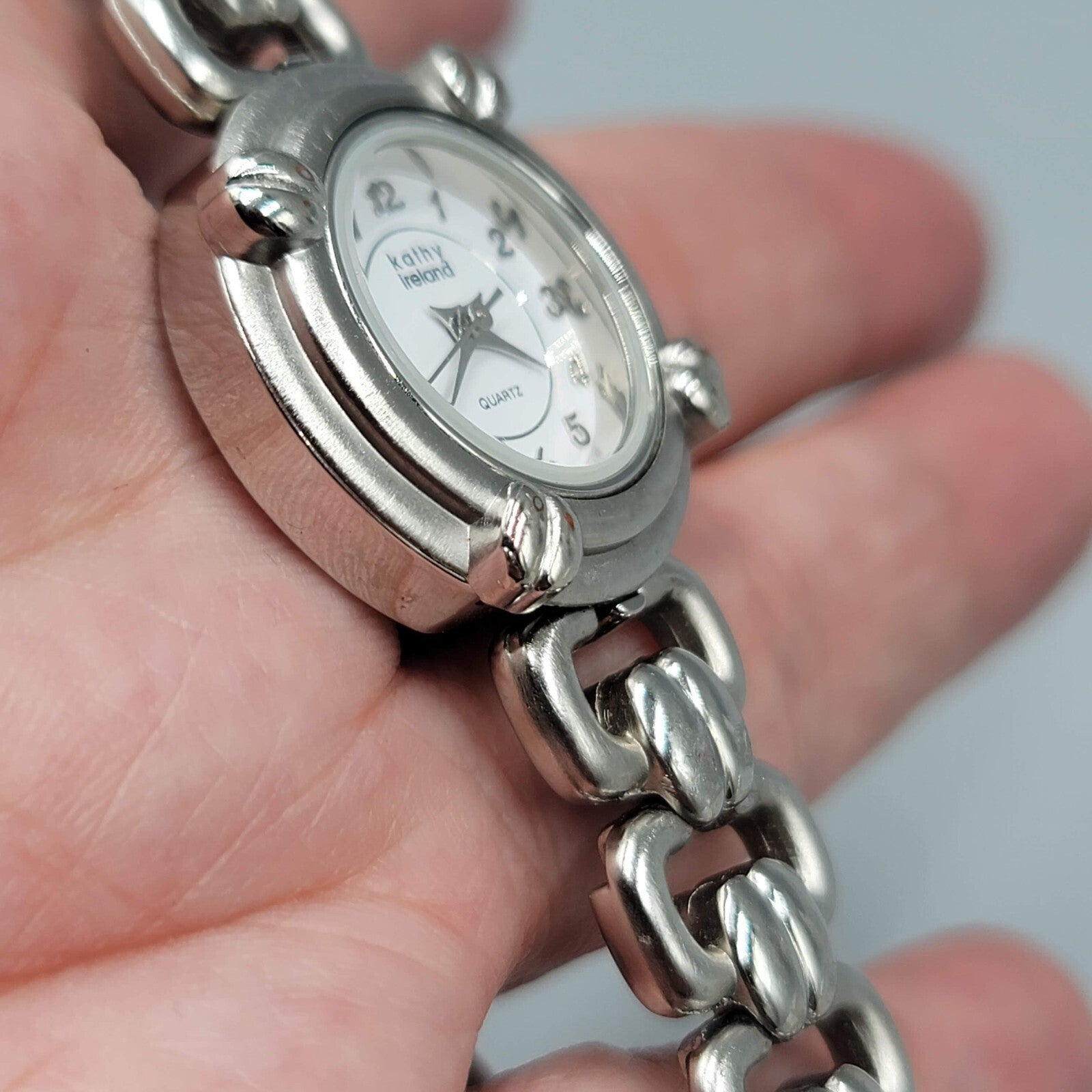 Kathy Ireland Quartz Watch Silver tone Stainless Band Women NEEDS BATTERY!