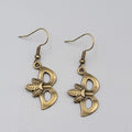 Masquerade Mask Pierced Earrings Bronze tone Metal Embossed Leaves Dangle  1"