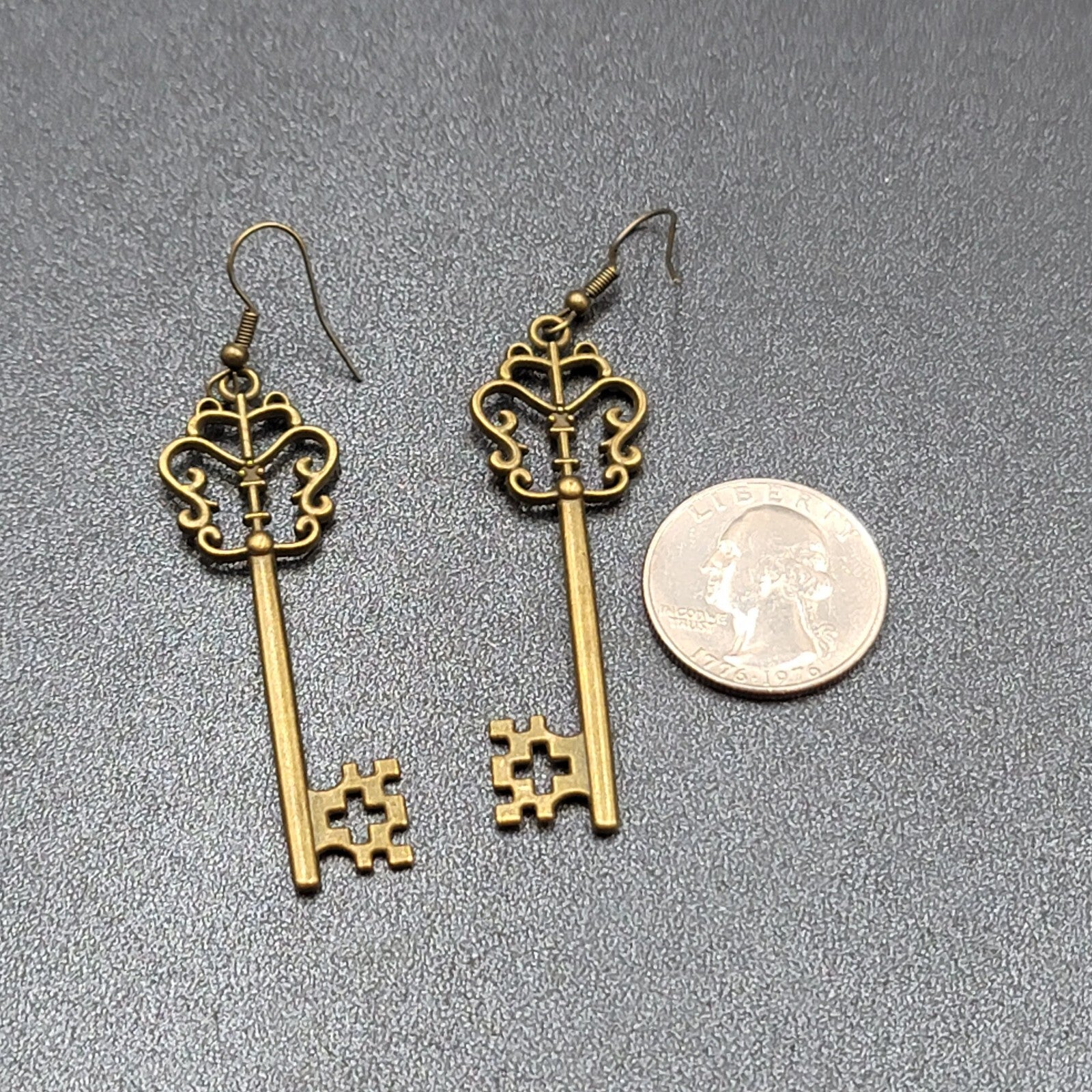 Pierced Earrings Bronze tone Long Antique Skeleton Key Dangle 2.25"
