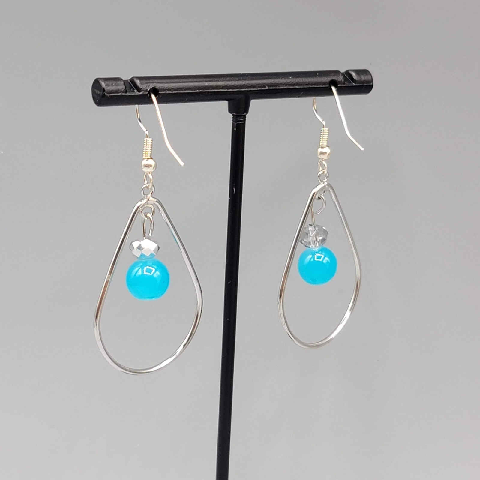 Pierced Earrings Silver tone Teardrop Hoops Blue Bead Dangle 1.5"