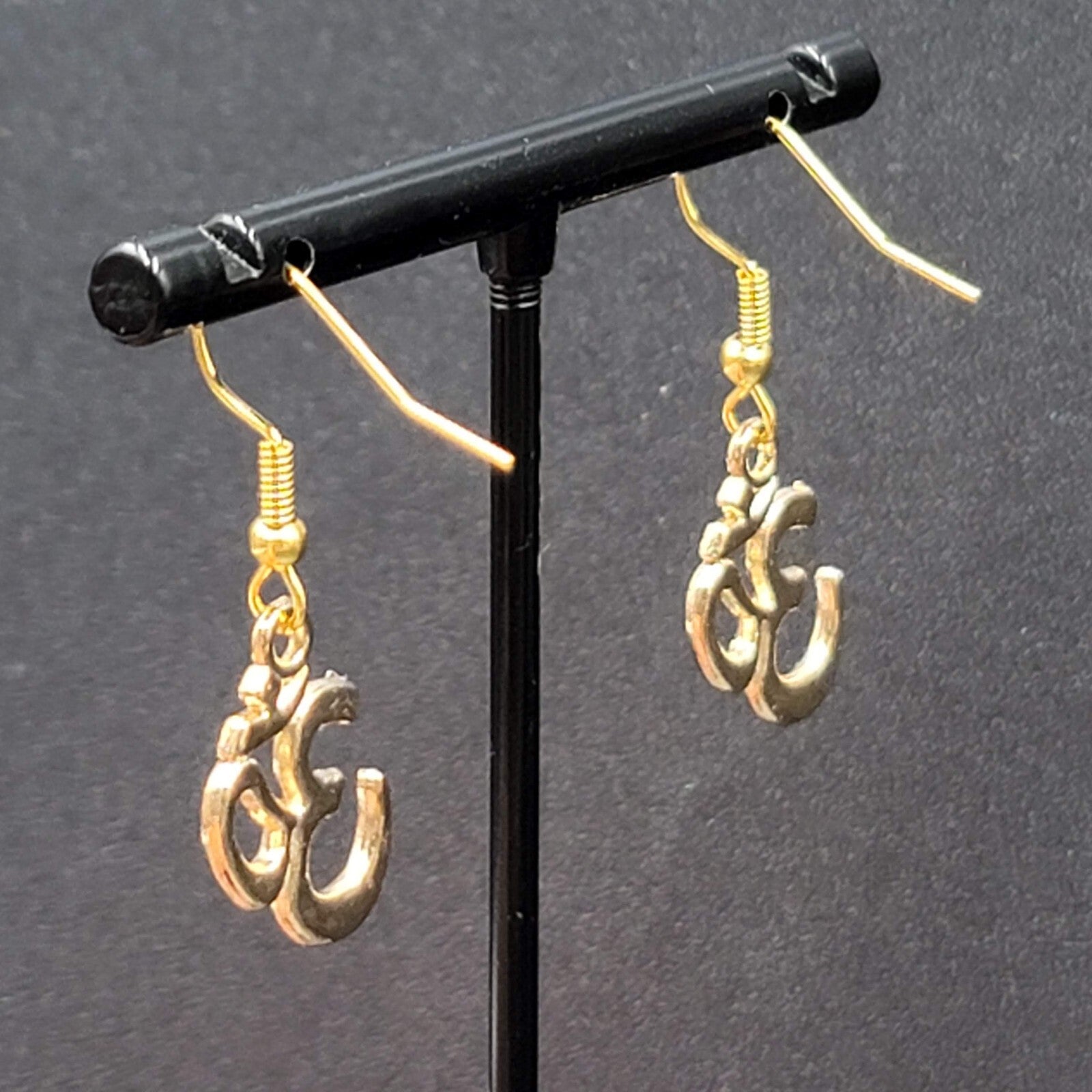 Ohm Pierced Earrings Gold tone Dangle 3/4"
