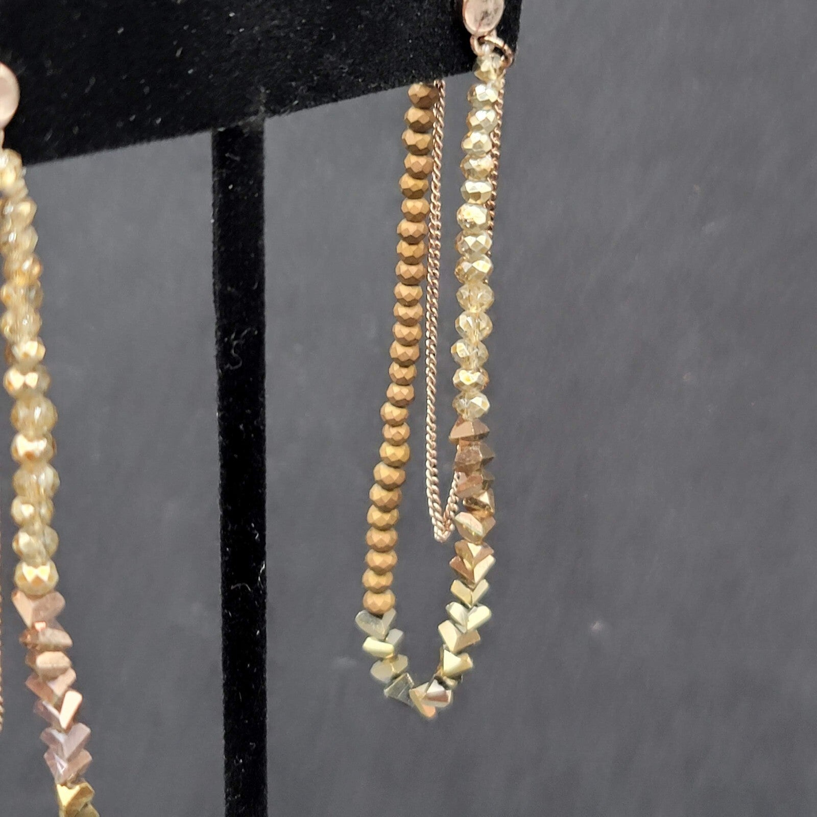 Pierced Earrings Gold tone Small Faceted Beads Dangle Loop To Back 3.25"