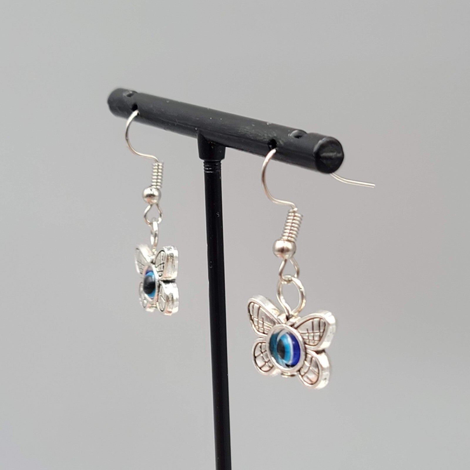 Butterfly Evil Eye Pierced Earrings Silver tone Blue Bead Dangle 5/8"