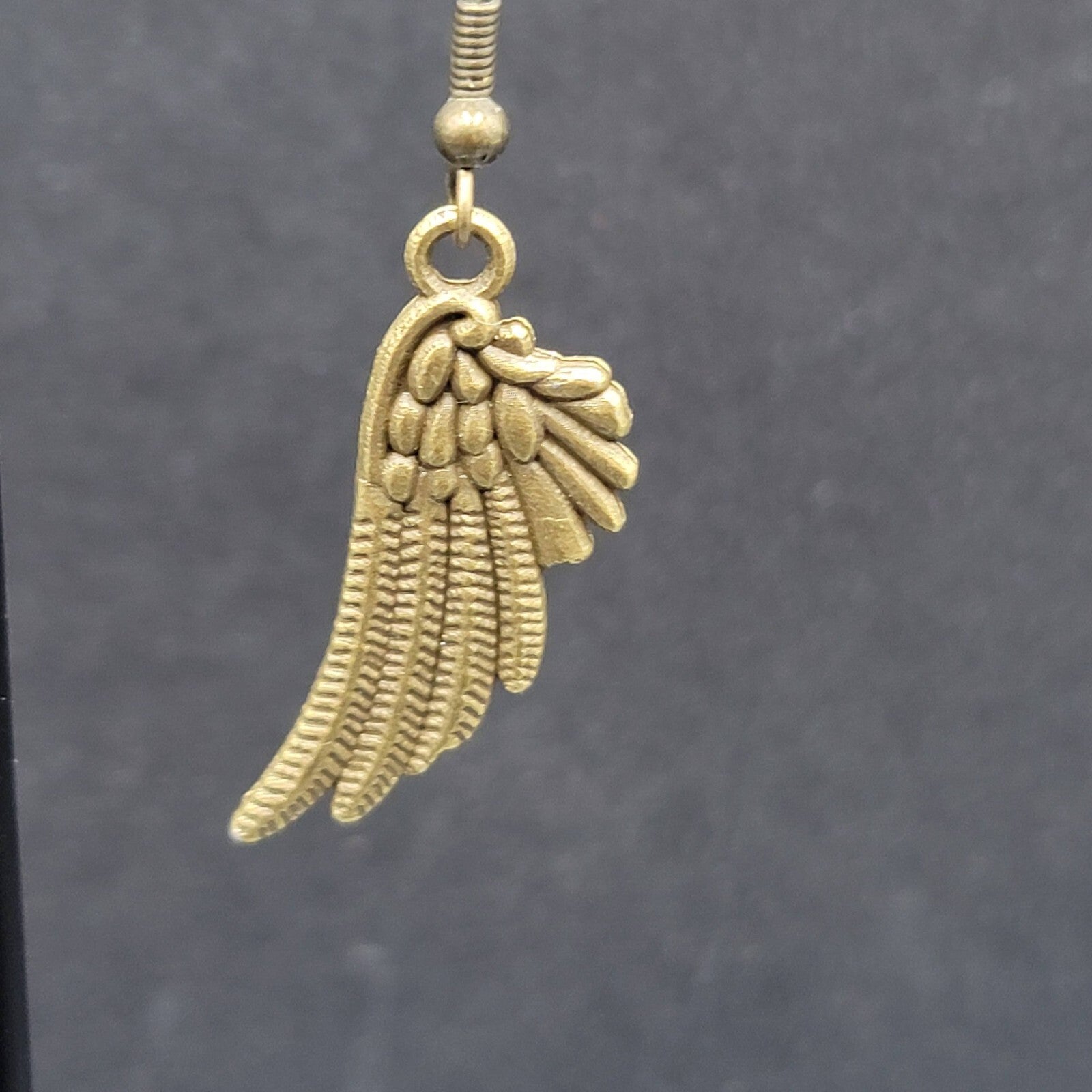 Feather Wings Pierced Earrings Bronze tone Metal Embossed Dangle 1 1/8"