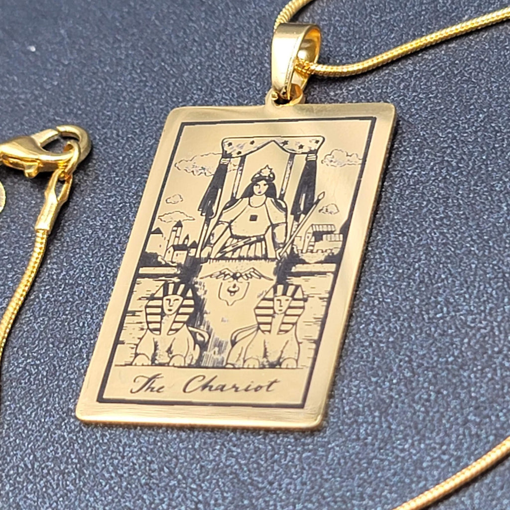 The CHARIOT Tarot Card Pendant Necklace Major Arcana Gold tone 18”.