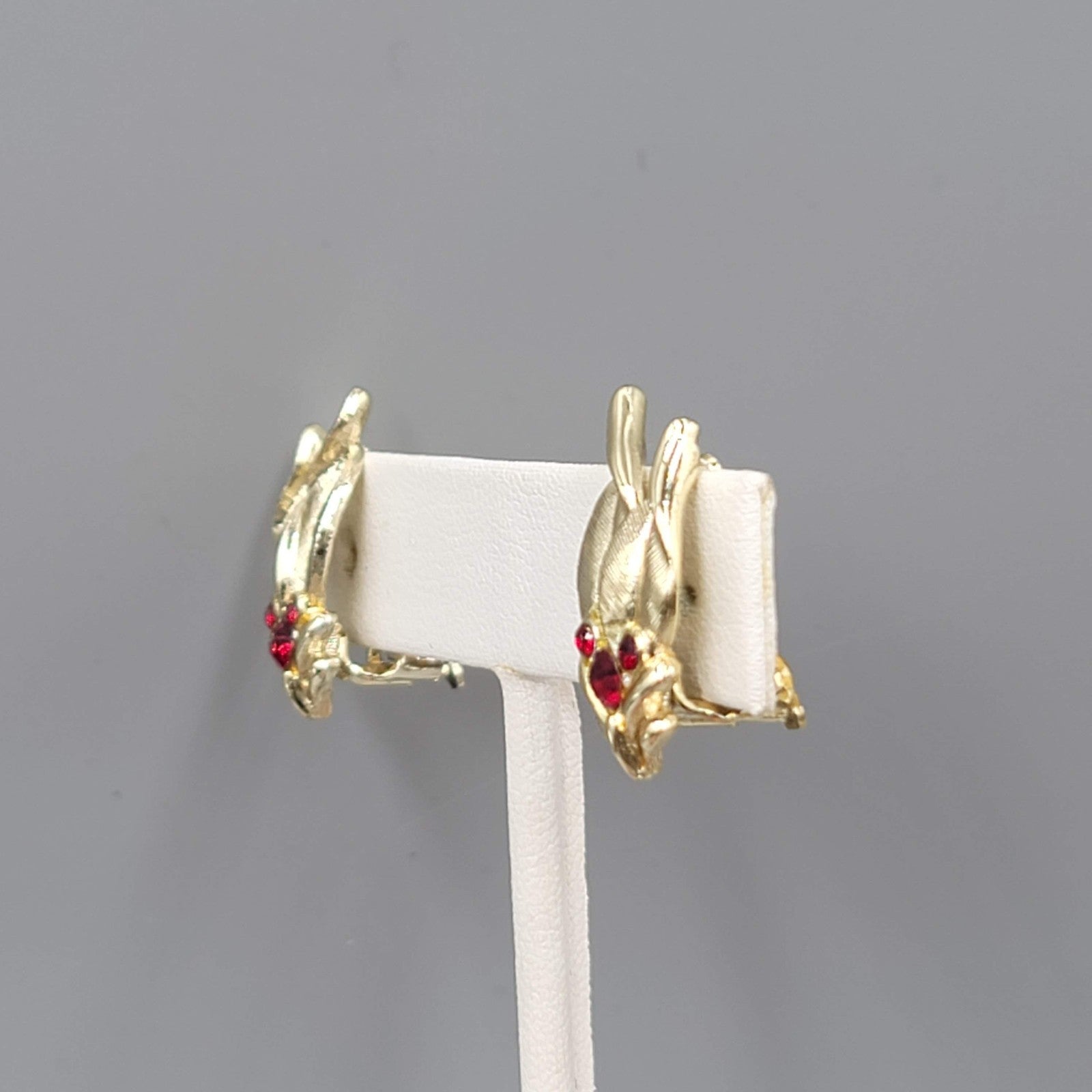 Vintage Red Rhinestone Clip on Earrings Gold tone Leaves 7/8"