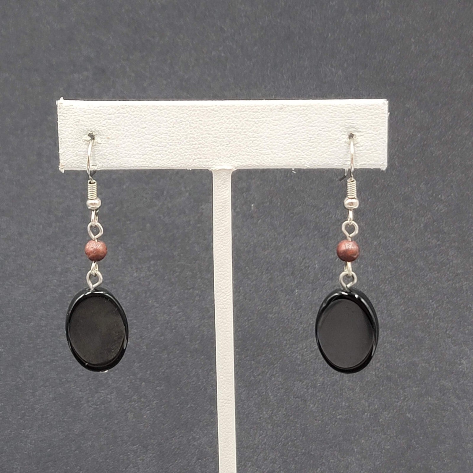 Pierced Earrings Silver tone Black Glass Oval Bead Dangle 1.25"