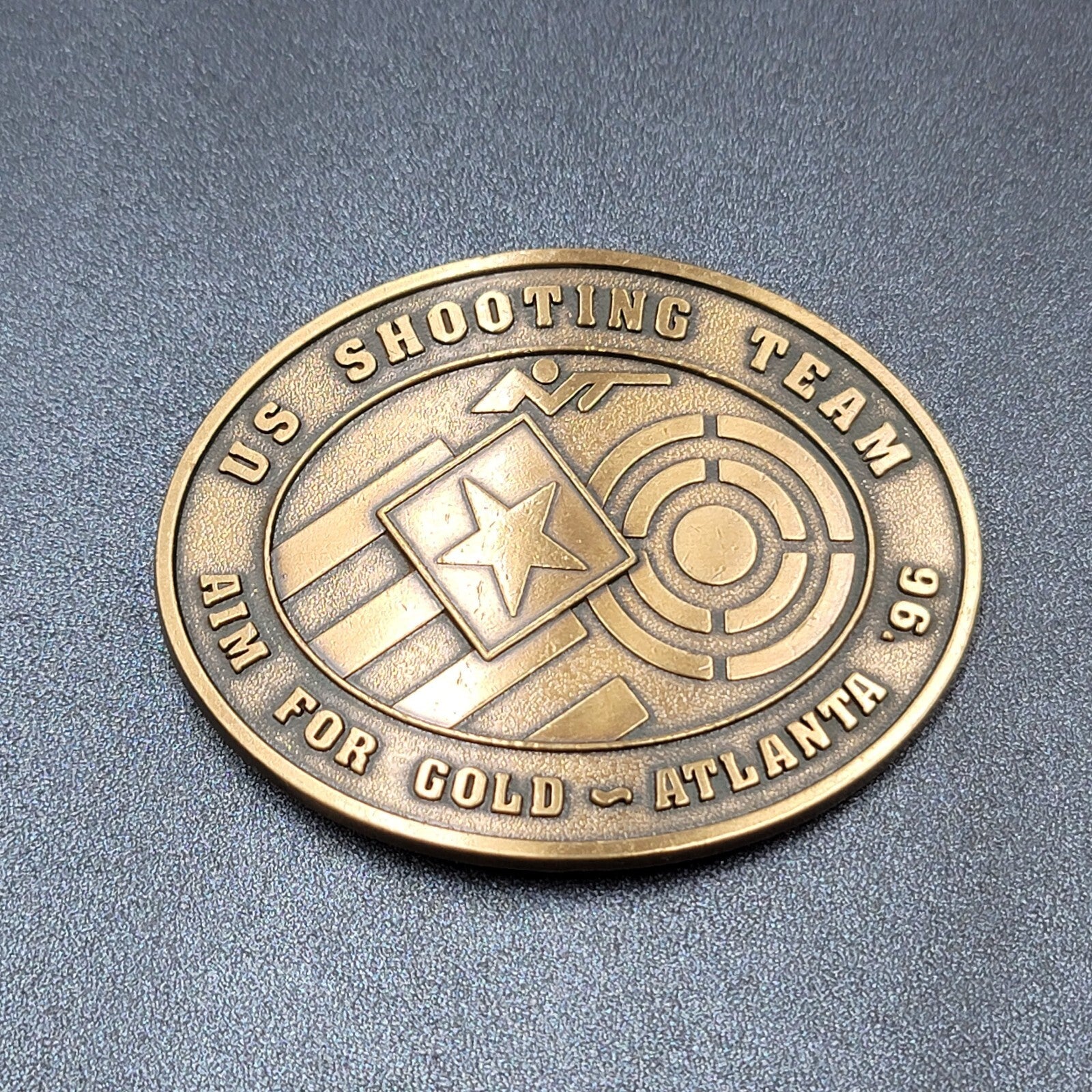 1996 US OLYMPICS ATLANTA SHOOTING TEAM BELT BUCKLE AIM FOR GOLD