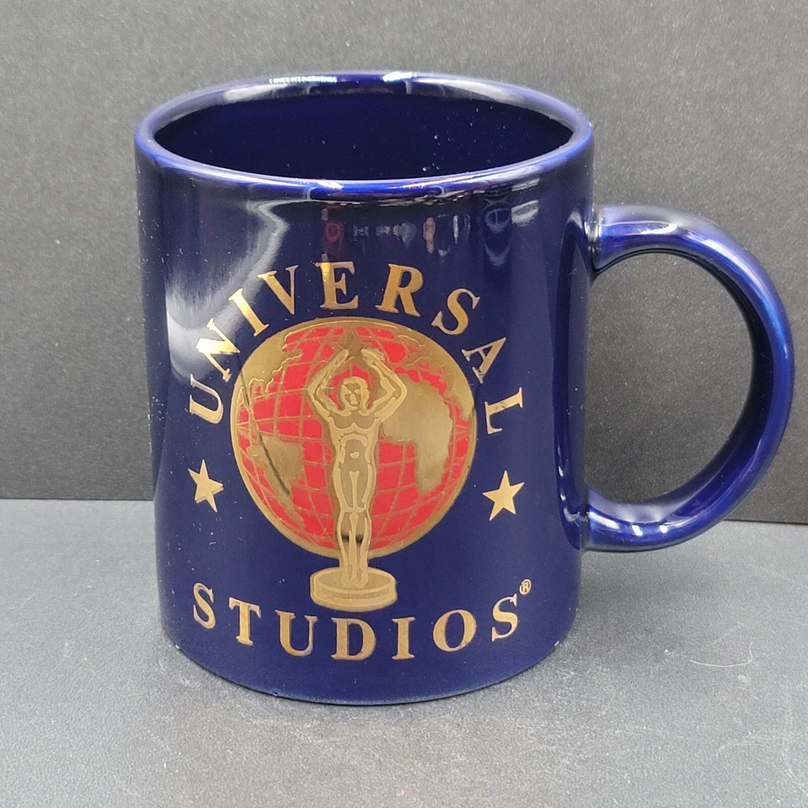 Universal Studios Coffee Mug Cup Navy Red Gold Golden Globe