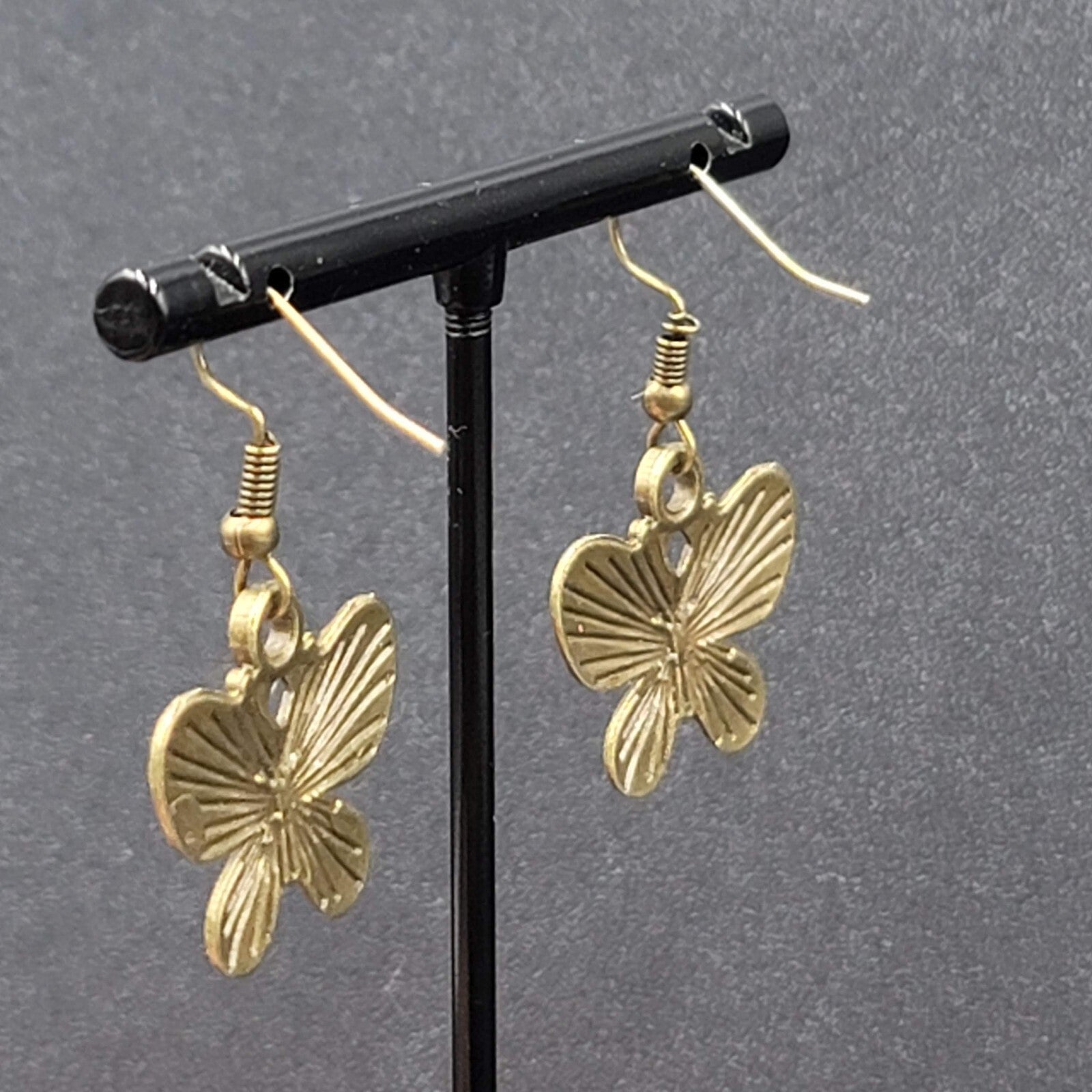 Butterfly Pierced Earrings Dangle Bronze tone Embossed 7/8"