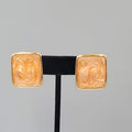 Vintage Monet Clip on Earrings Gold plated Rectangle Peach Swirl Enamel Drop 1"