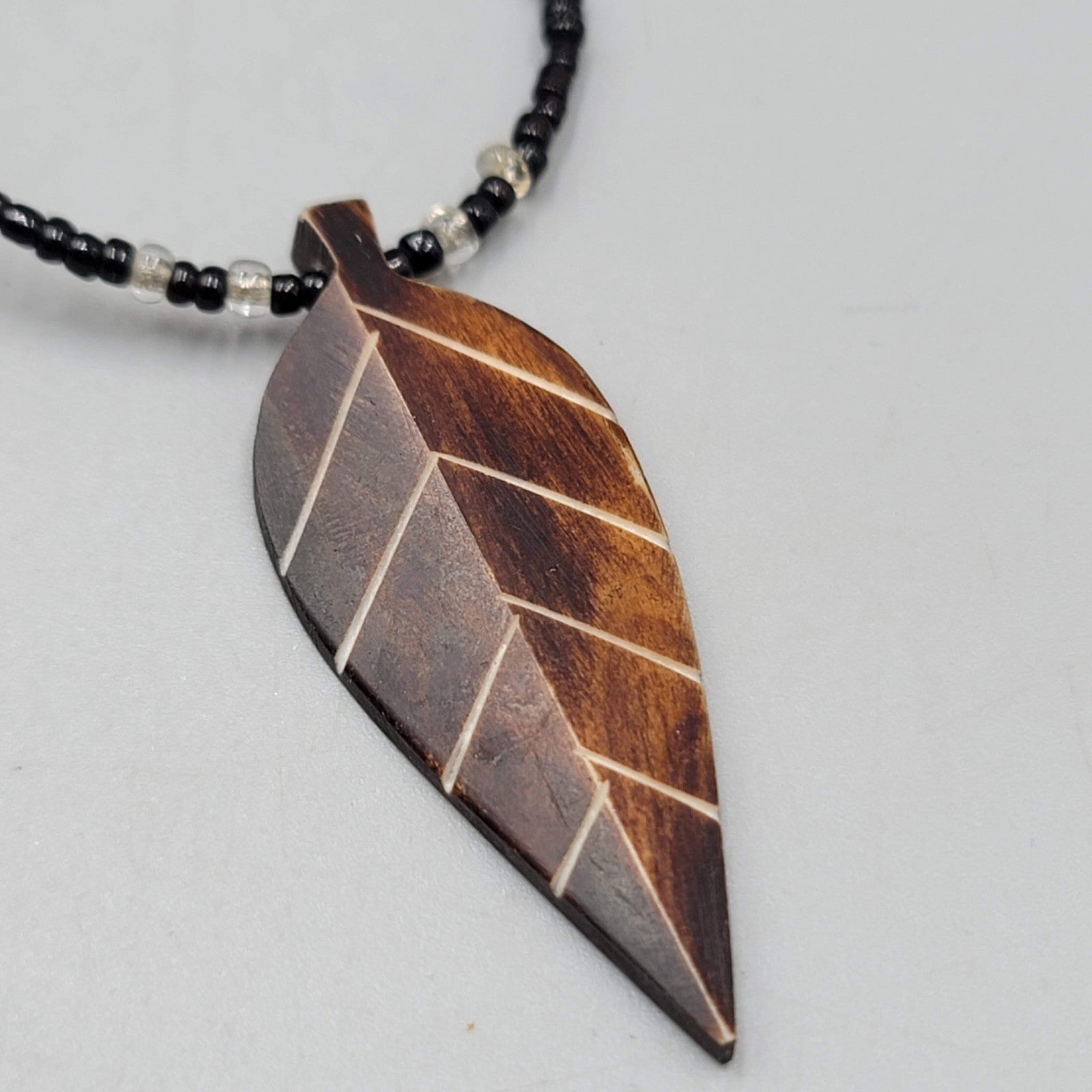 Hand Carved Leaf Pendant Necklace Black Seed Bead 16"