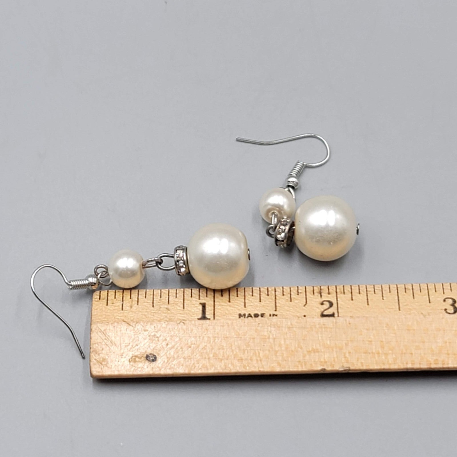 Satin Look White Bead Pierced Earrings Silver tone Dangle 1.25 in