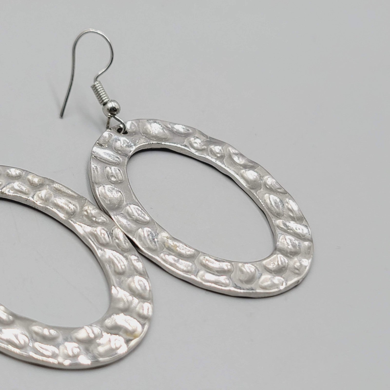 Open Oval Dangle Pierced Earrings Hammered Metal Silver tone 1.75"