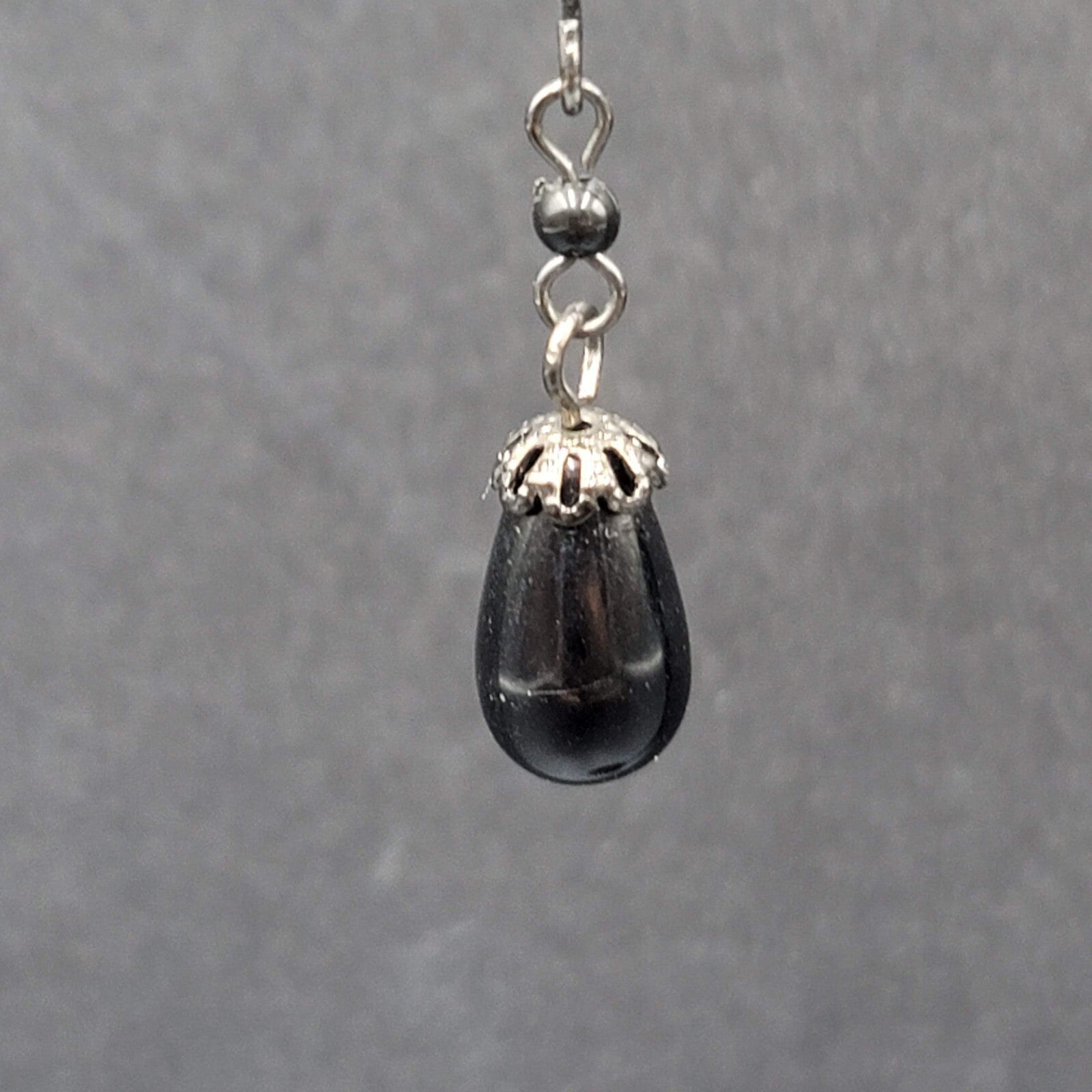 Pierced Earrings Black Metal Capped Teardrop Bead 3/4"