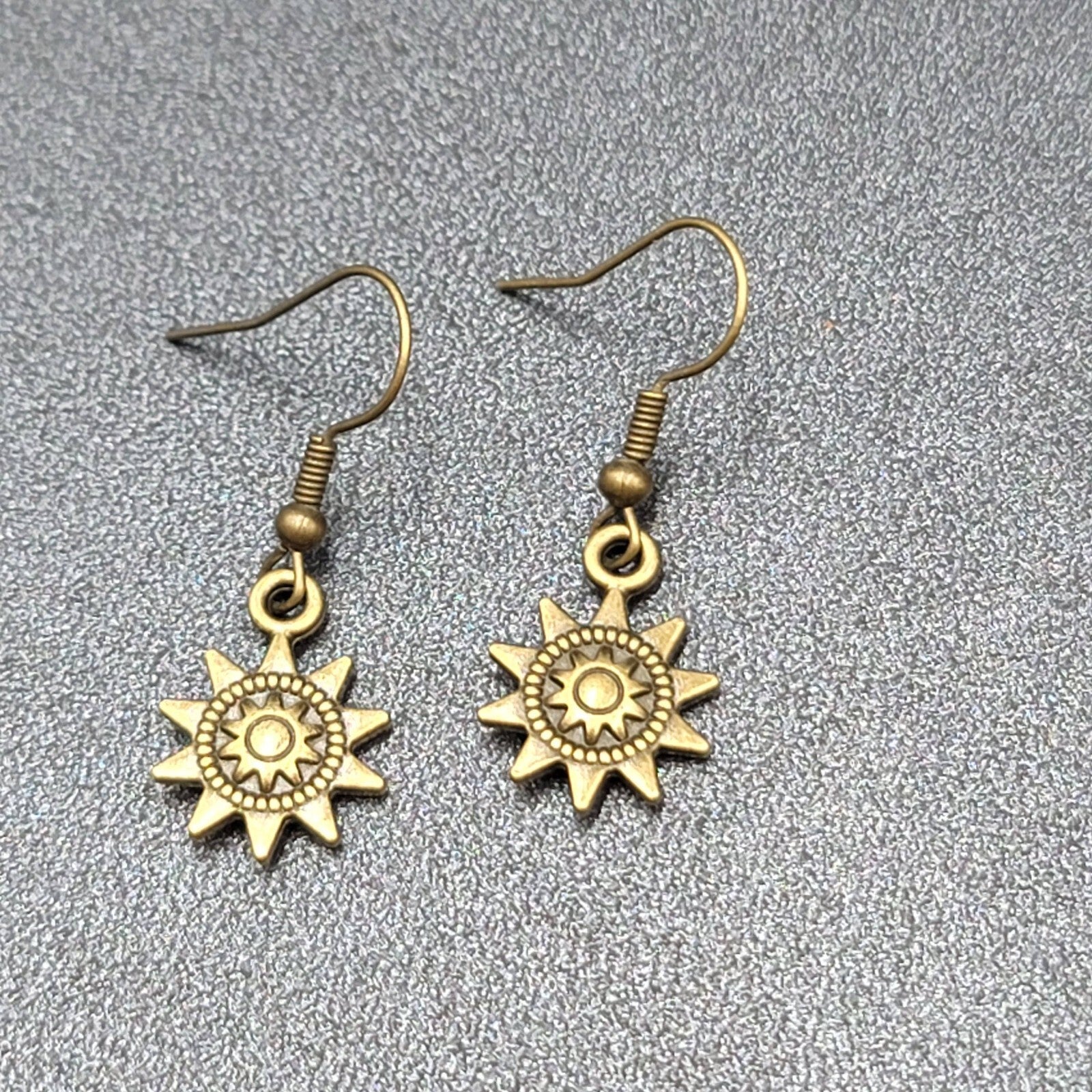 Sun Pierced Earrings Bronze tone Embossed Dangle New 5/8"
