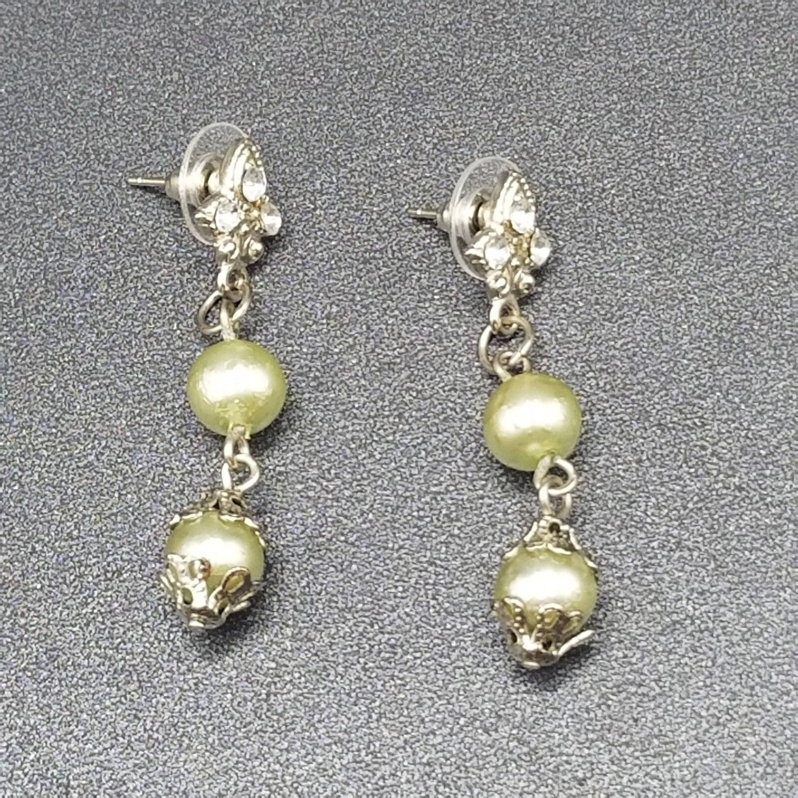 AVON Pierced Earrings Silver tone Capped Green Bead Dangle 1.75"
