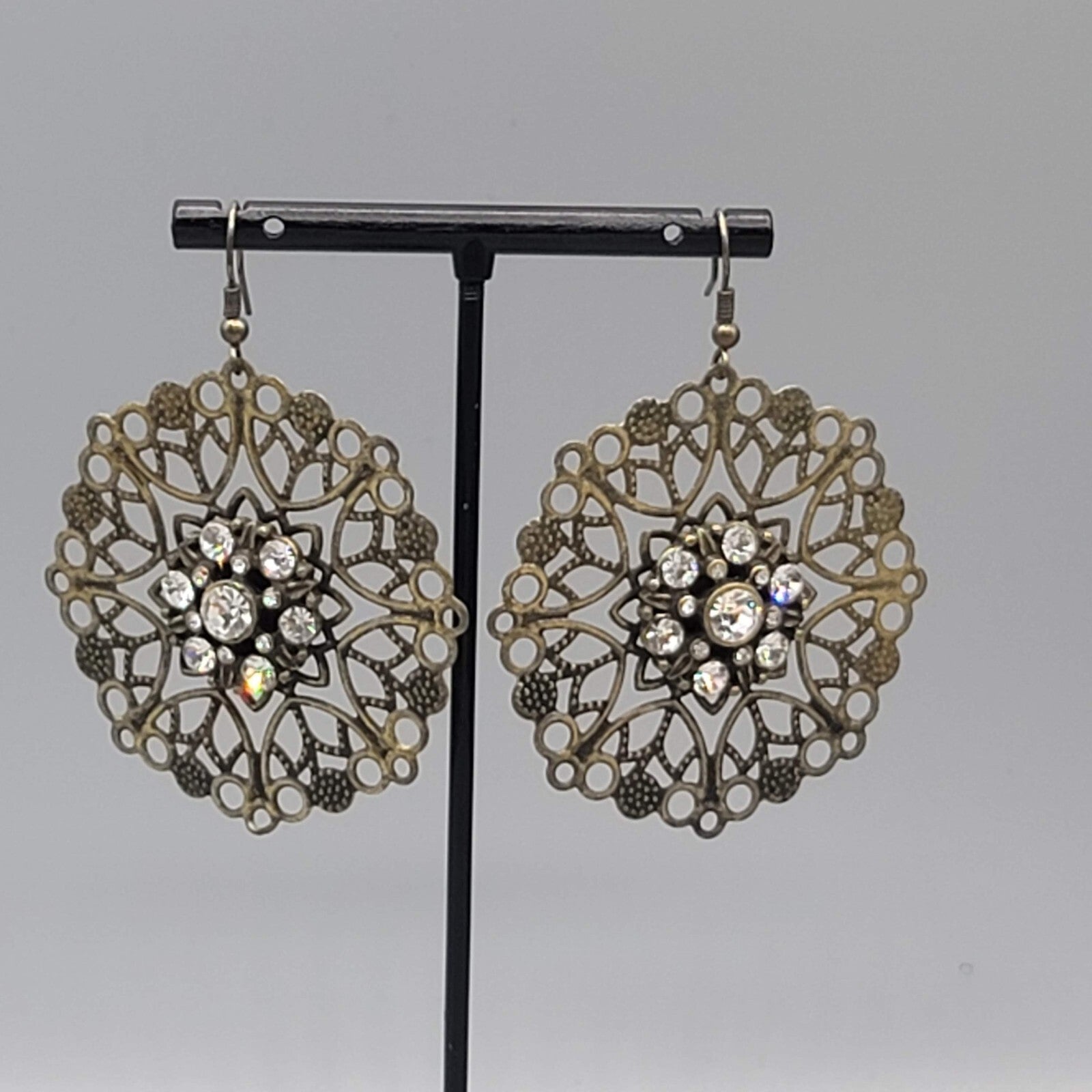 Pierced Earrings Bronze tone Large Metal Filigree Rhinestone Center Boho 1.75"