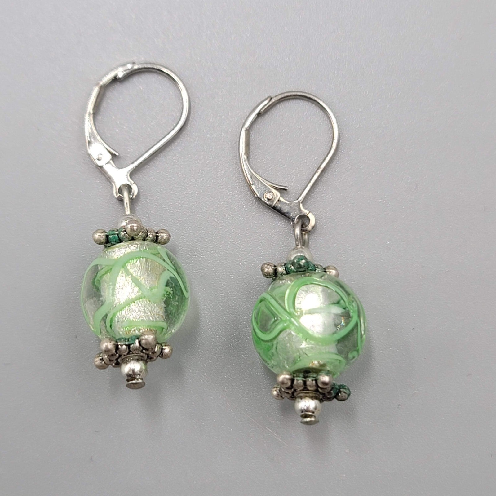 Green Swirl Glass Bead Pierced Earrings Silver tone Dangle 3/4"