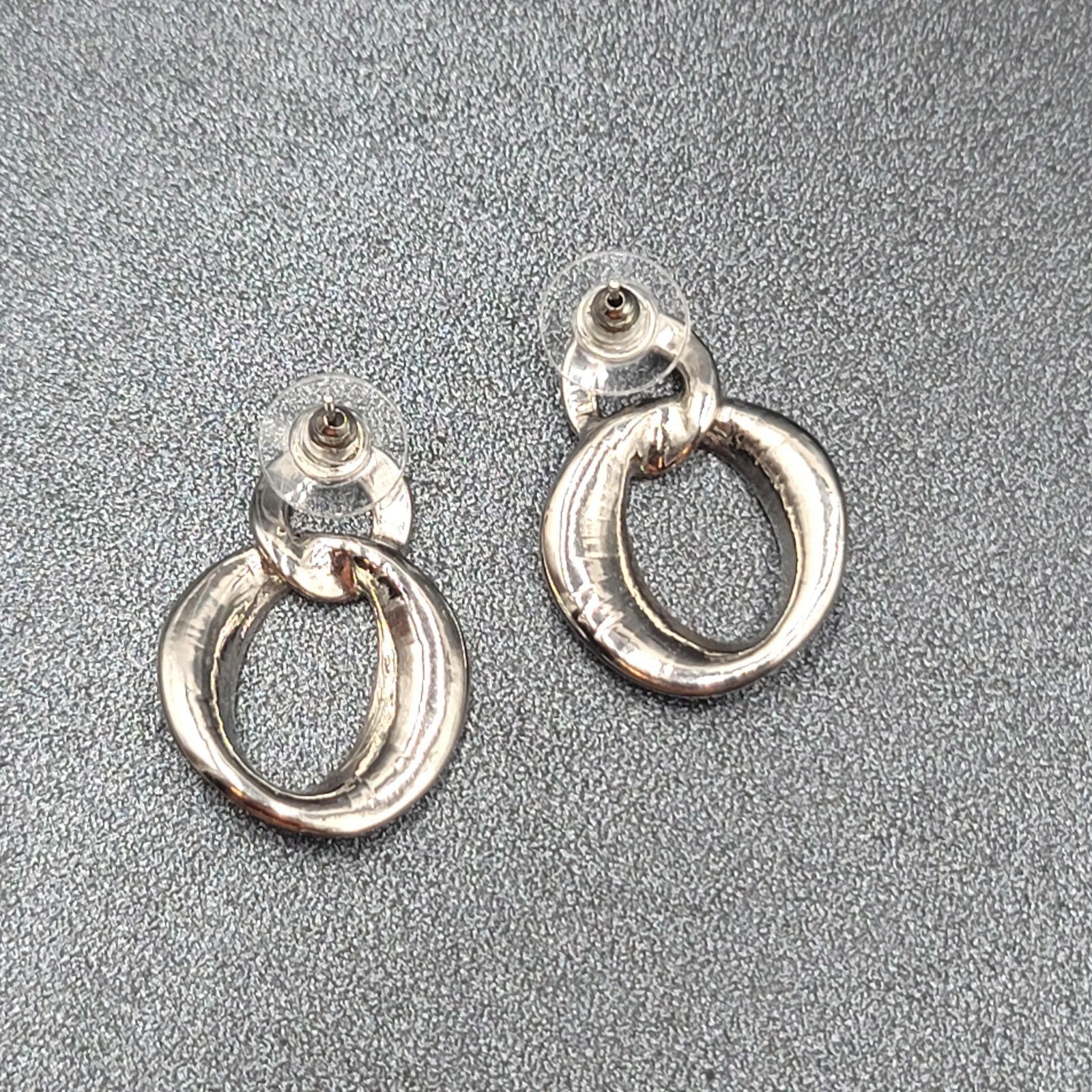 Pierced Earrings Silver tone Iridescent Glitter Interlocking Rings Drop 1 1/8"