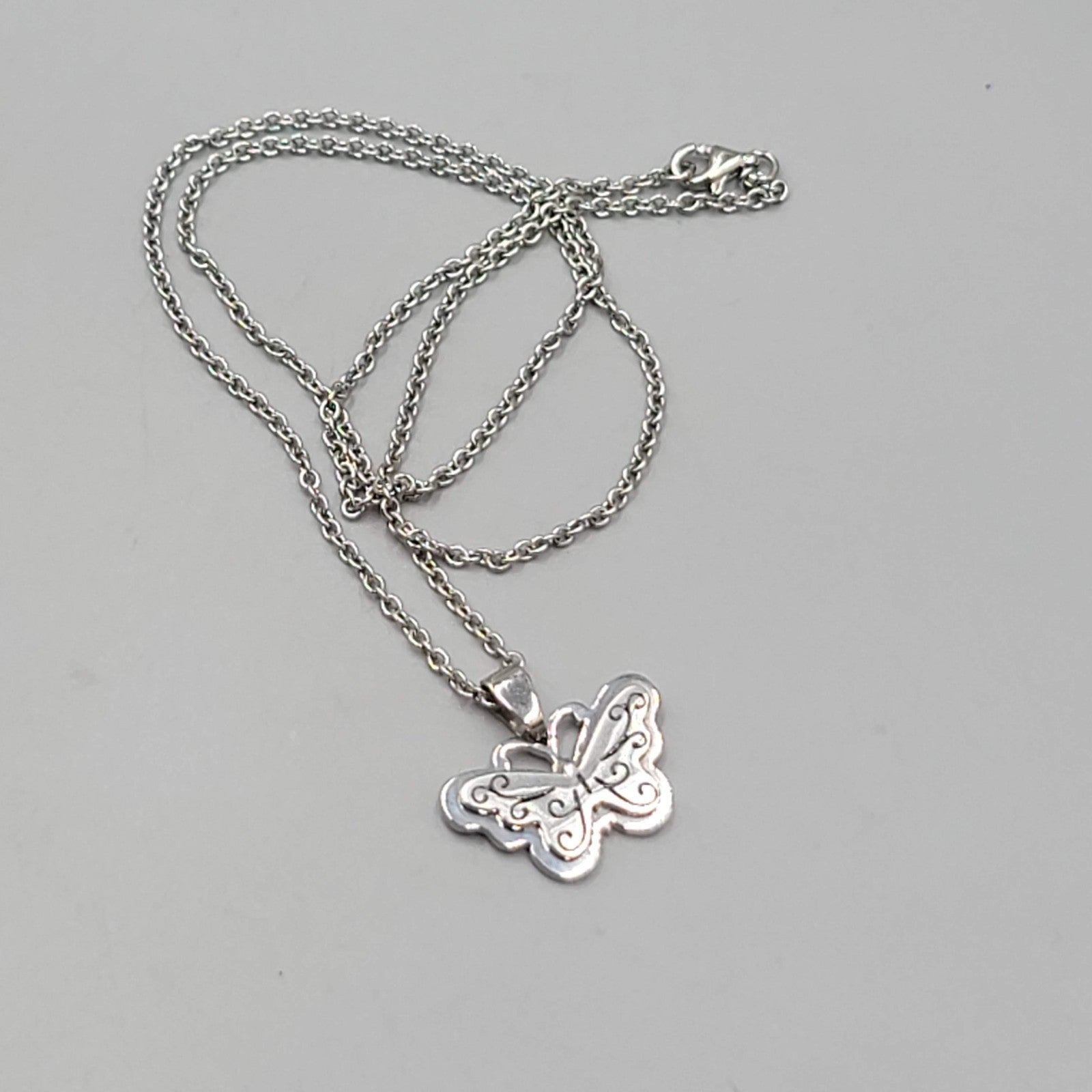 JCM Embrace Life Butterfly Pendant Necklace Silver tone Stainless Steel 18 in
