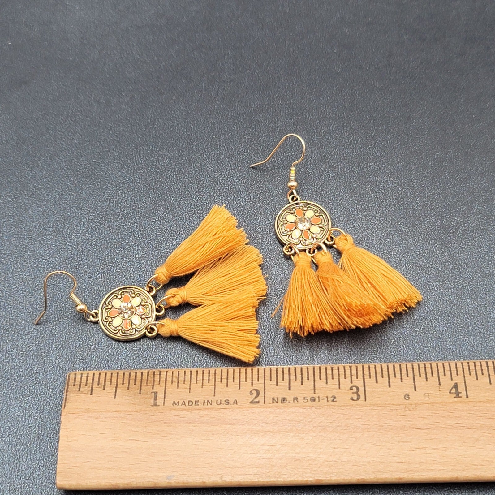 Pierced Earrings Gold tone Orange Tassel Rhinestone Medallion Dangle 1.75"
