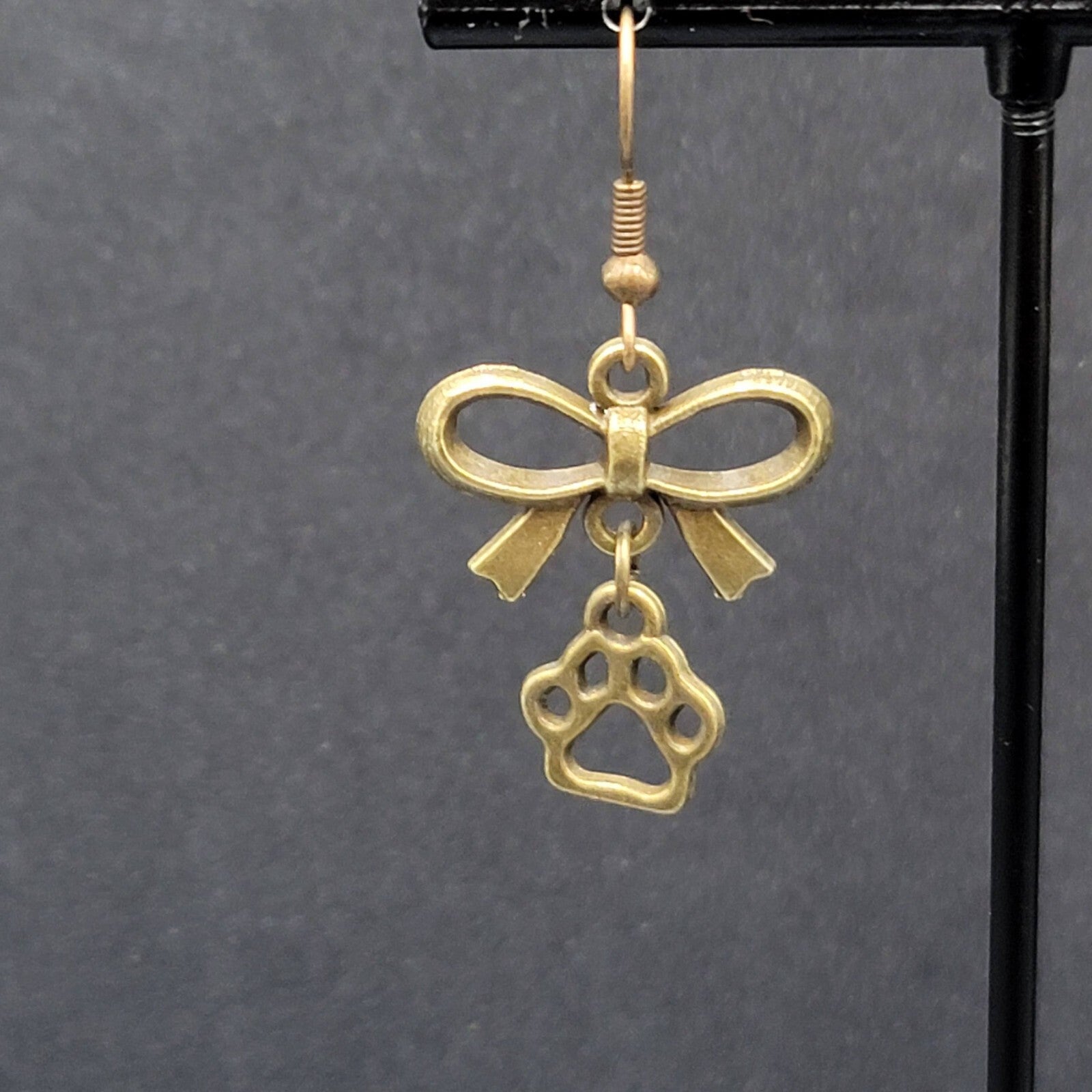 Pierced Bow Dog Paws Earrings Bronze tone Dangle 7/8"