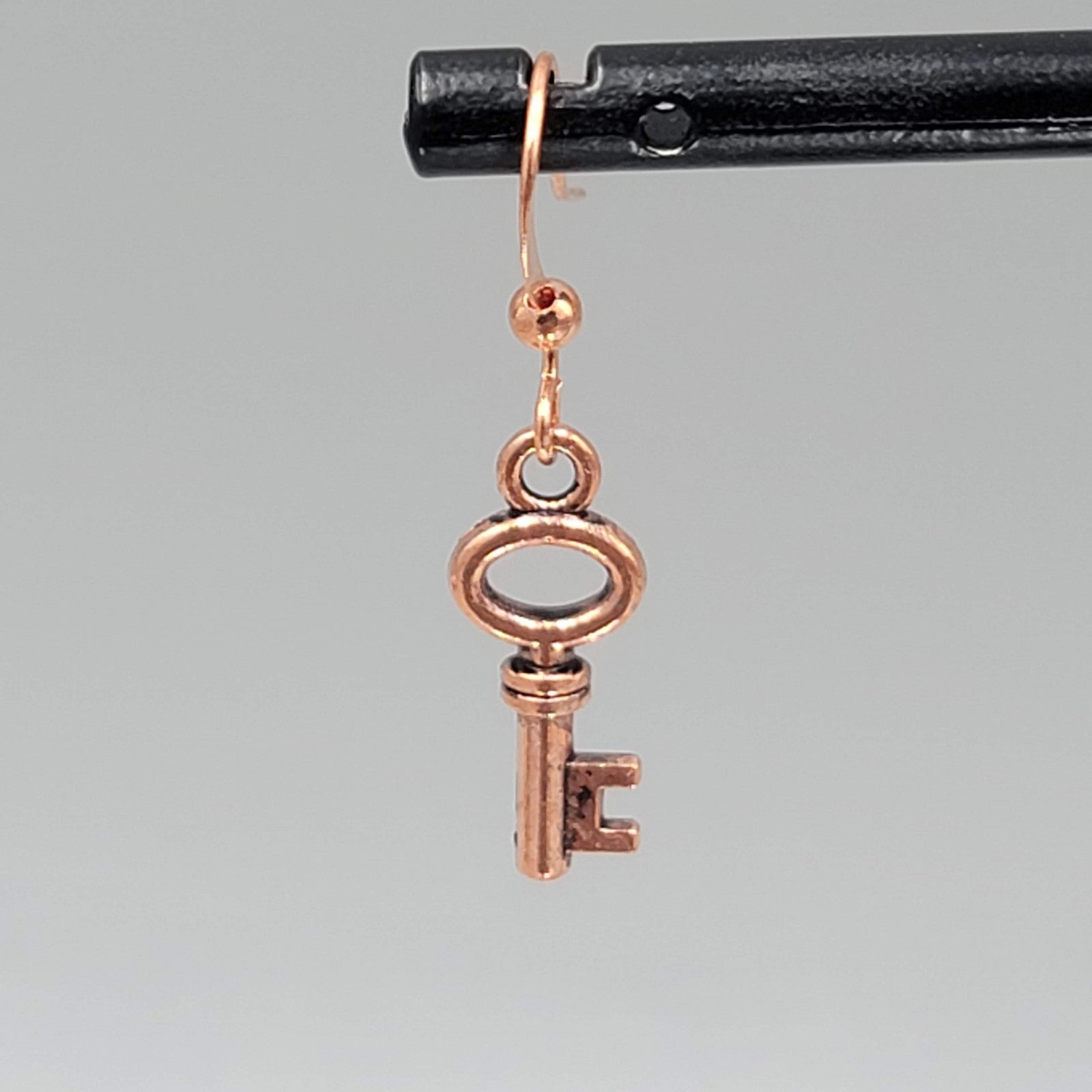 Copper tone Skeleton Key Pierced Earrings Dangle Small 3/4"