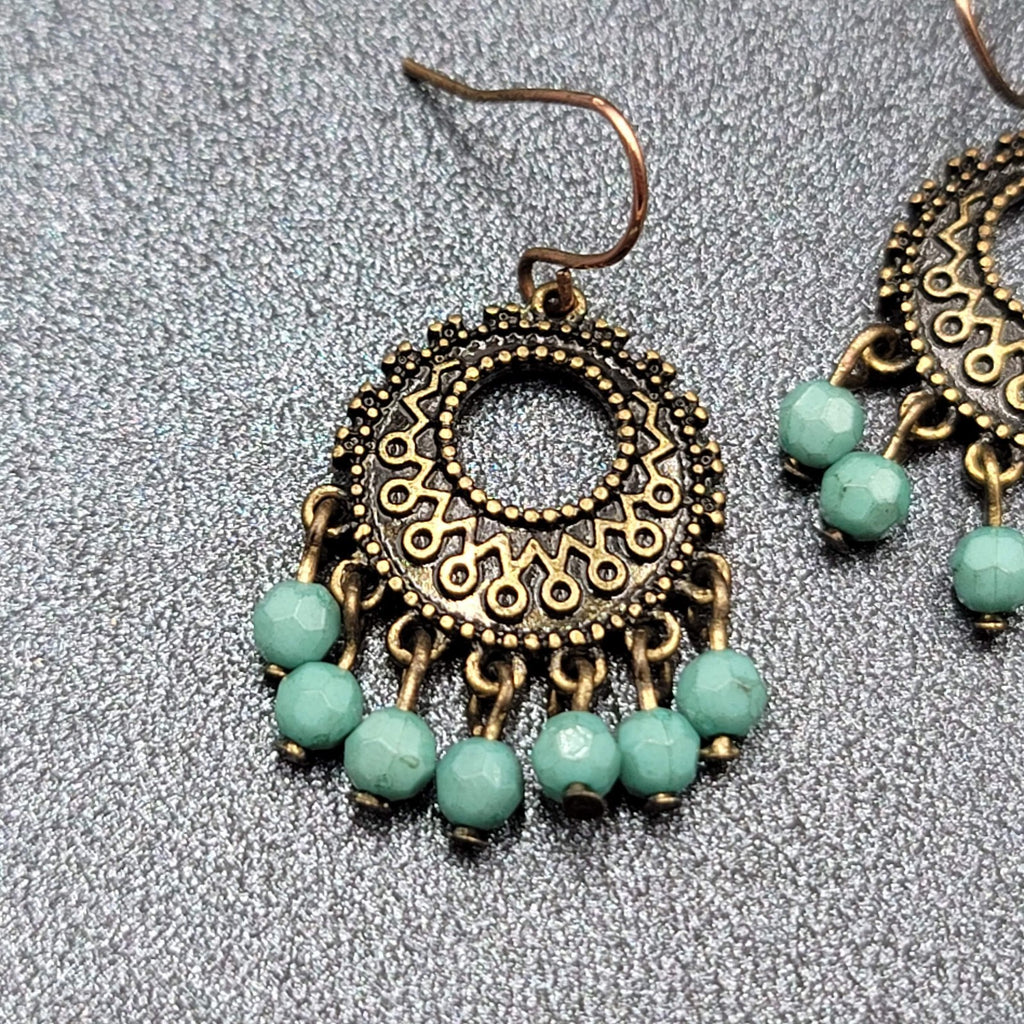 Pierced Earrings Bronze tone Blue Bead Medallion 1"