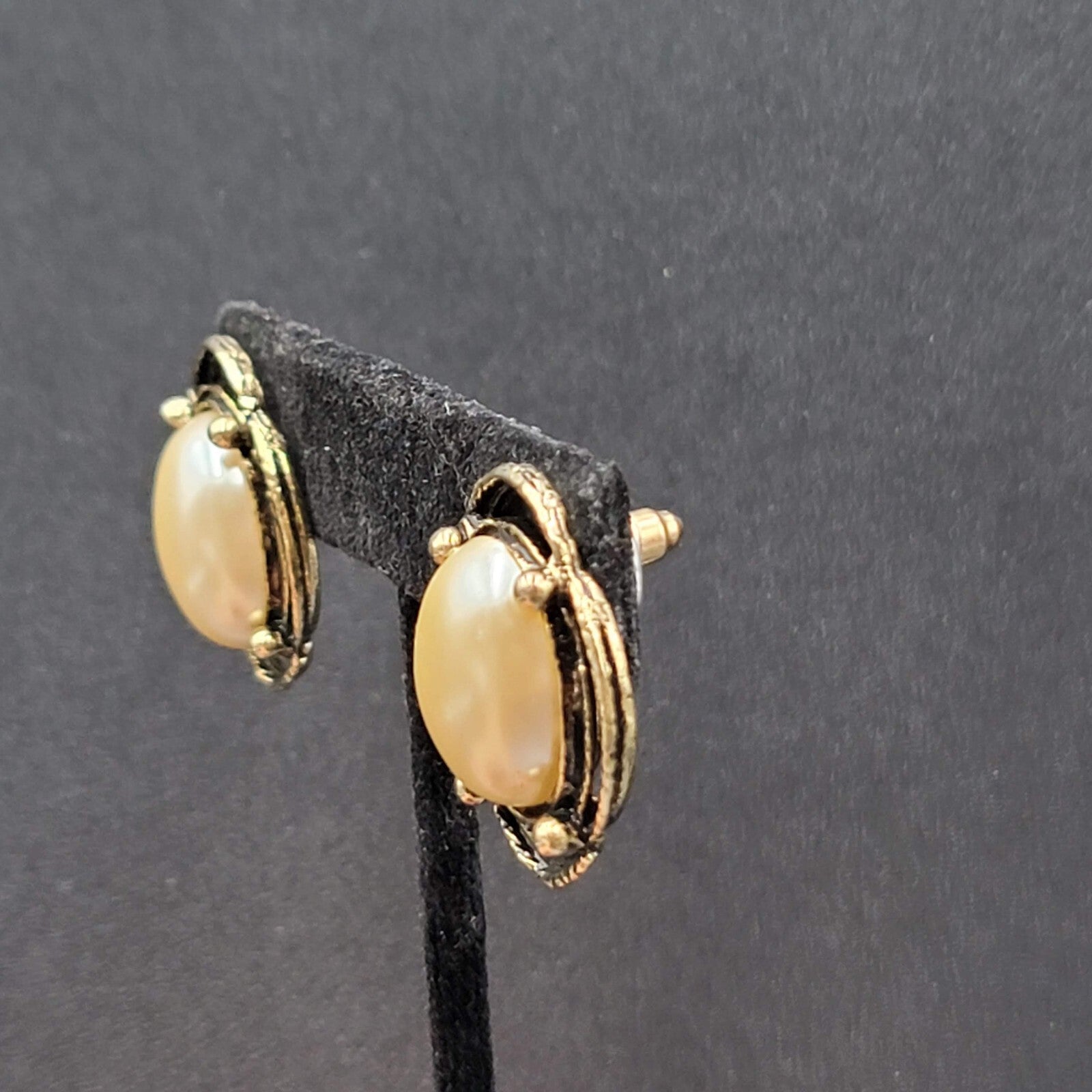 Vintage Pierced Earrings Gold tone White Cabochon Oval Drop 1"